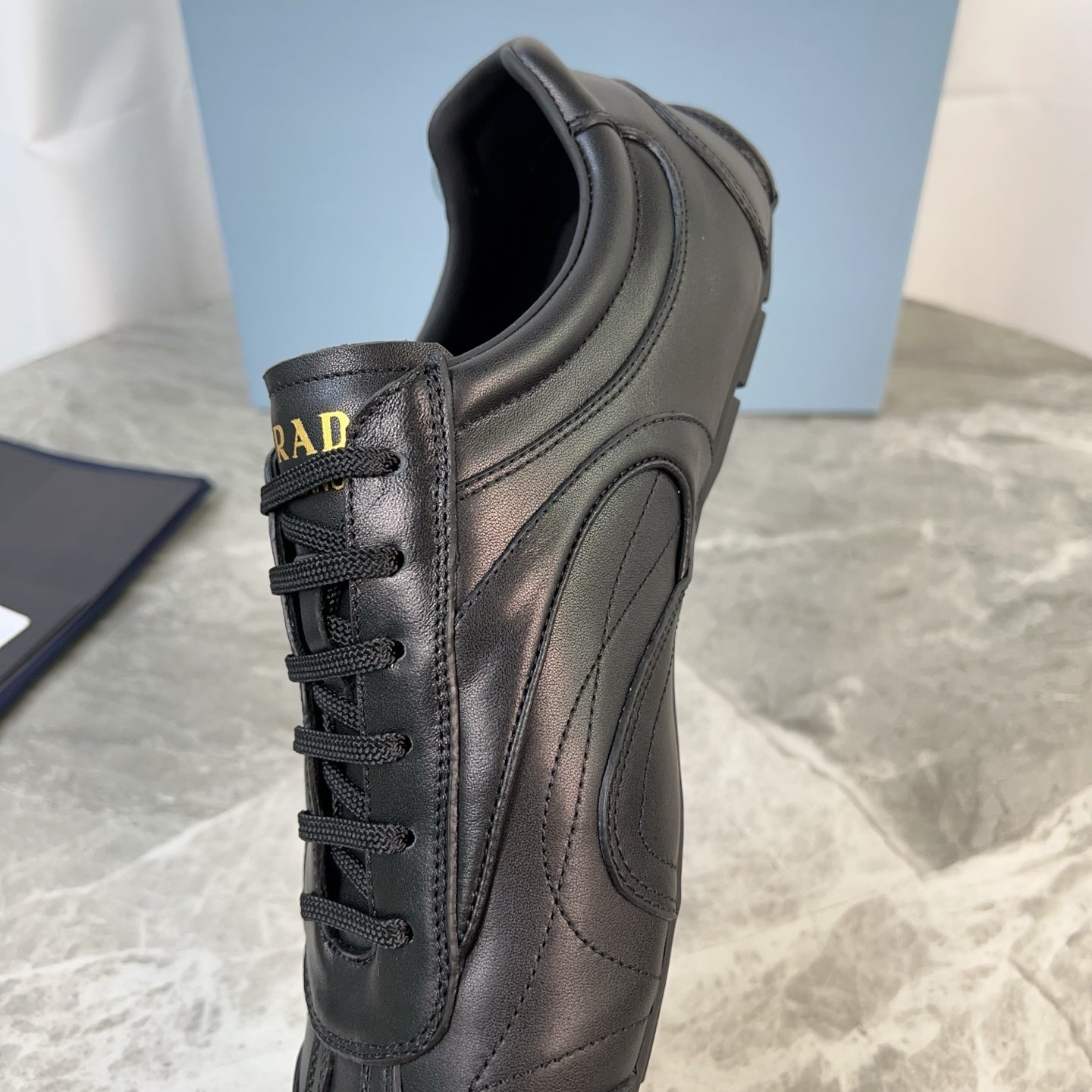 PRADA 25S MONTECARLO ANTIQUED SNEAKERS IN BLACK NAPPA LEATHER - 35