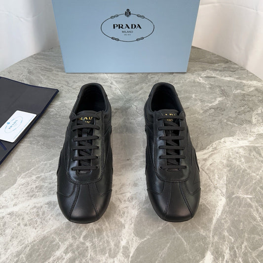 PRADA 25S MONTECARLO ANTIQUED SNEAKERS IN BLACK NAPPA LEATHER - 35