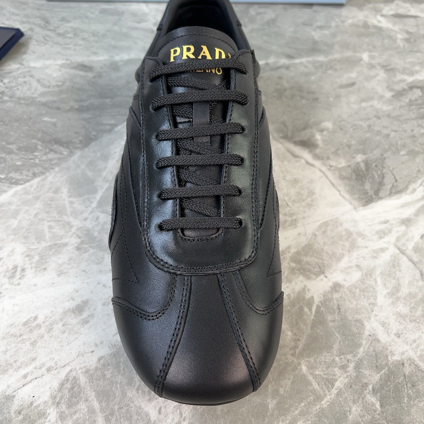 PRADA 25S MONTECARLO ANTIQUED SNEAKERS IN BLACK NAPPA LEATHER - 35