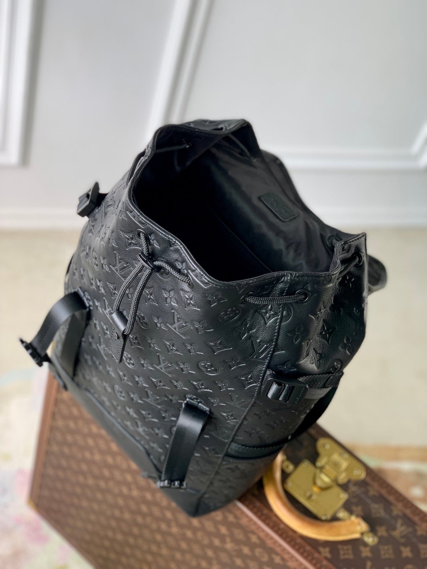 GETAWAY BACKPACK 50 IN BLACK MONOGRAM ECLIPSE CANVAS AND CALFSKIN EMBOSSED LOGO