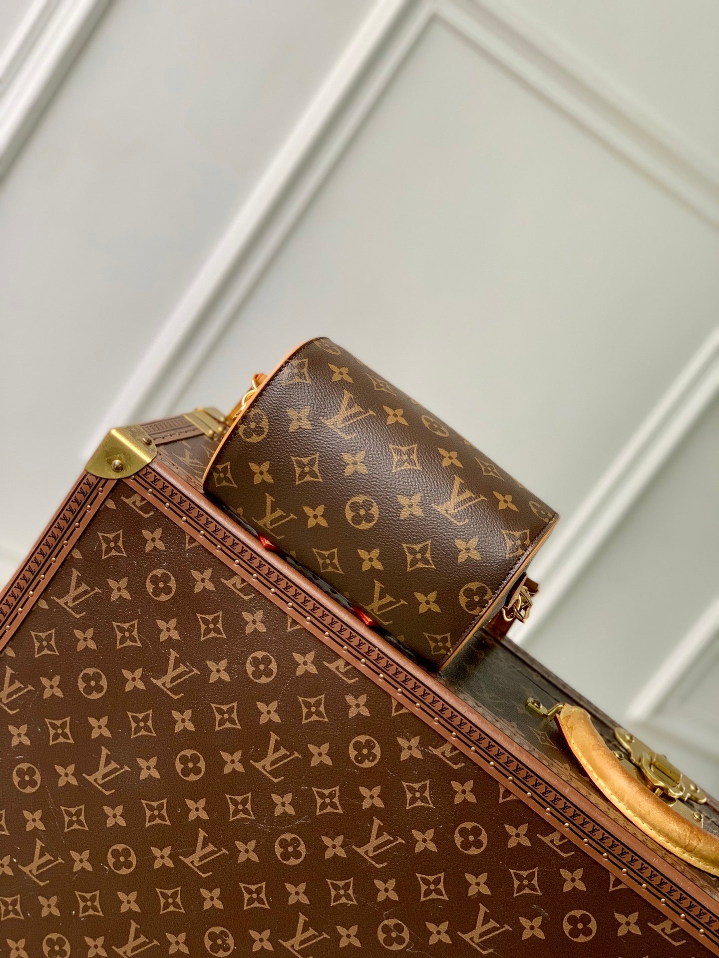 NANO SPEEDY DATING 18 IN BROWN COATED CANVAS GOLD HARDWARE