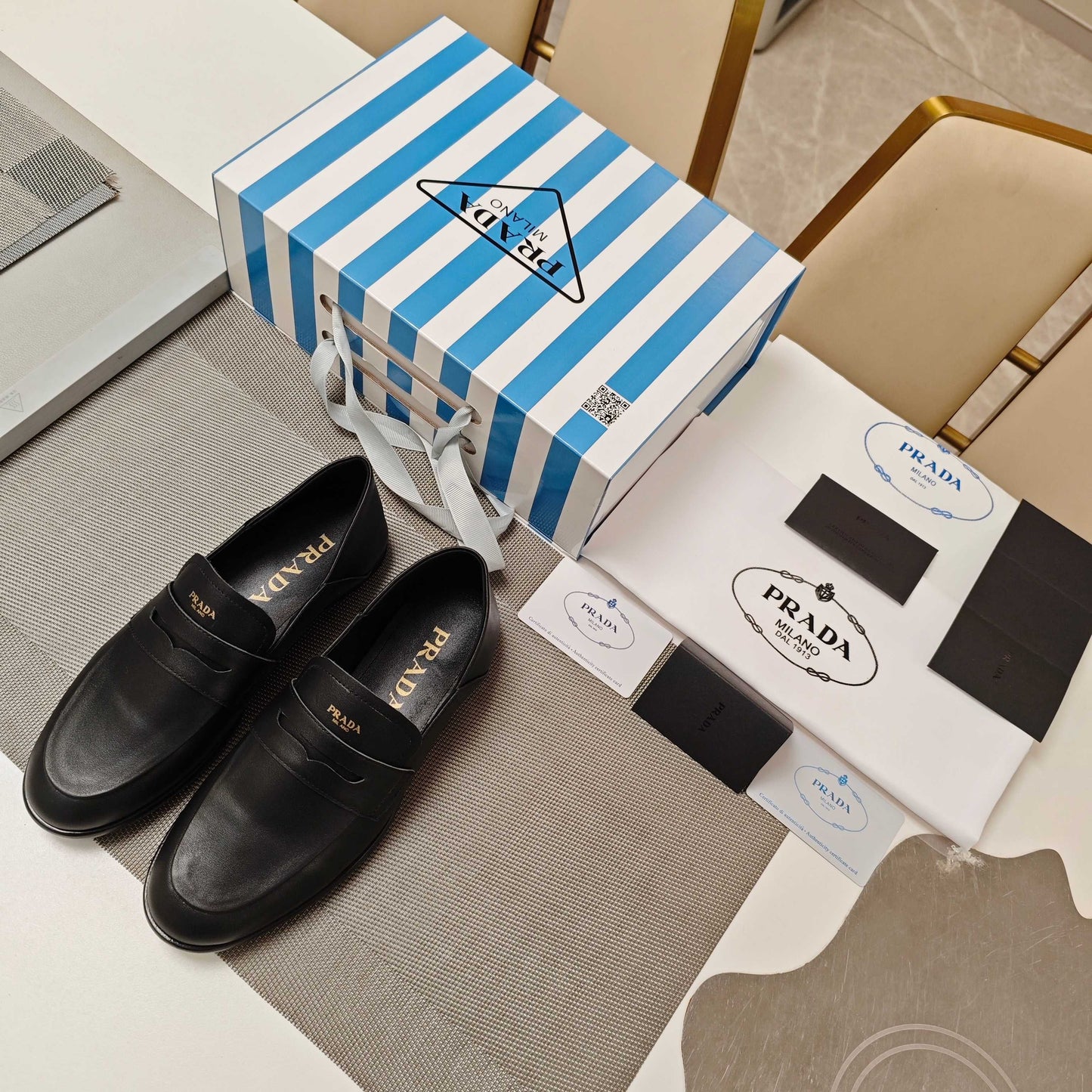PRADA 26S LOAFERS 20MM IN BLACK CALFSKIN