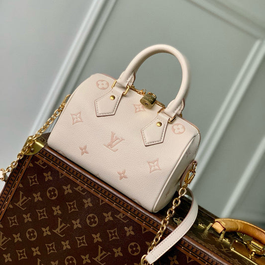 SPEEDY BANDOULIÈRE 20.5 IN LIGHT PINK MONOGRAM EMPREINTE CANVAS