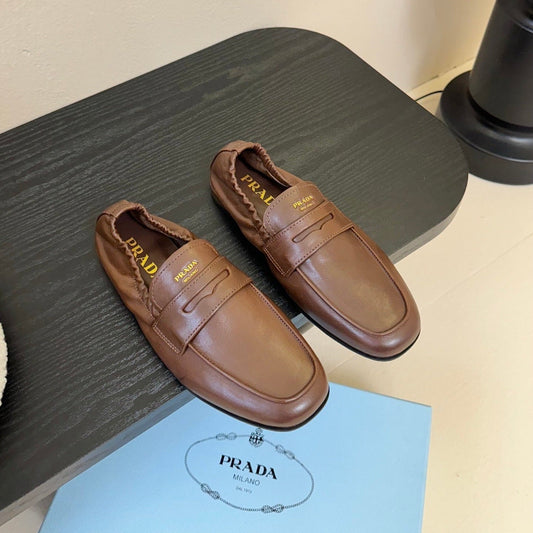 PRADA 25S SHUFFLE LOAFERS IN EARTH BROWN CALFSKIN - 35