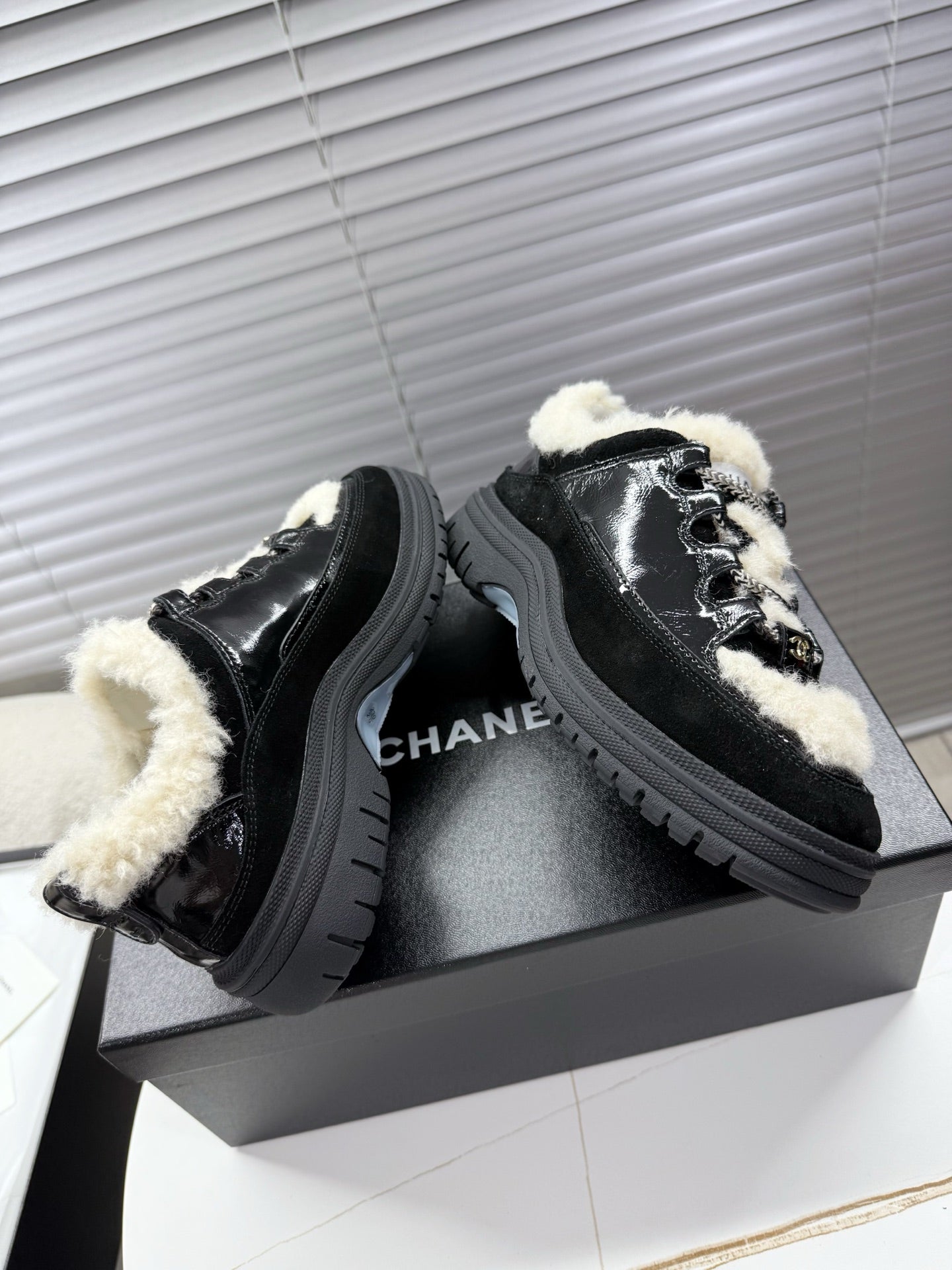 CHANEL 25S SNEAKERS WITH FUR ACCENTS 35MM IN BLACK CALFSKIN - 35