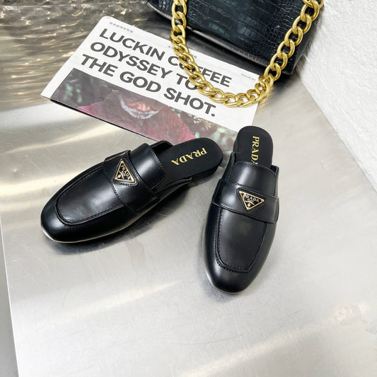 PRADA 26S МЮЛІ-ЛОФЕРИ З ЧОРНОЇ ТЕЛЯЧОЇ ШКІРИ З ЛОГОТИПОМ