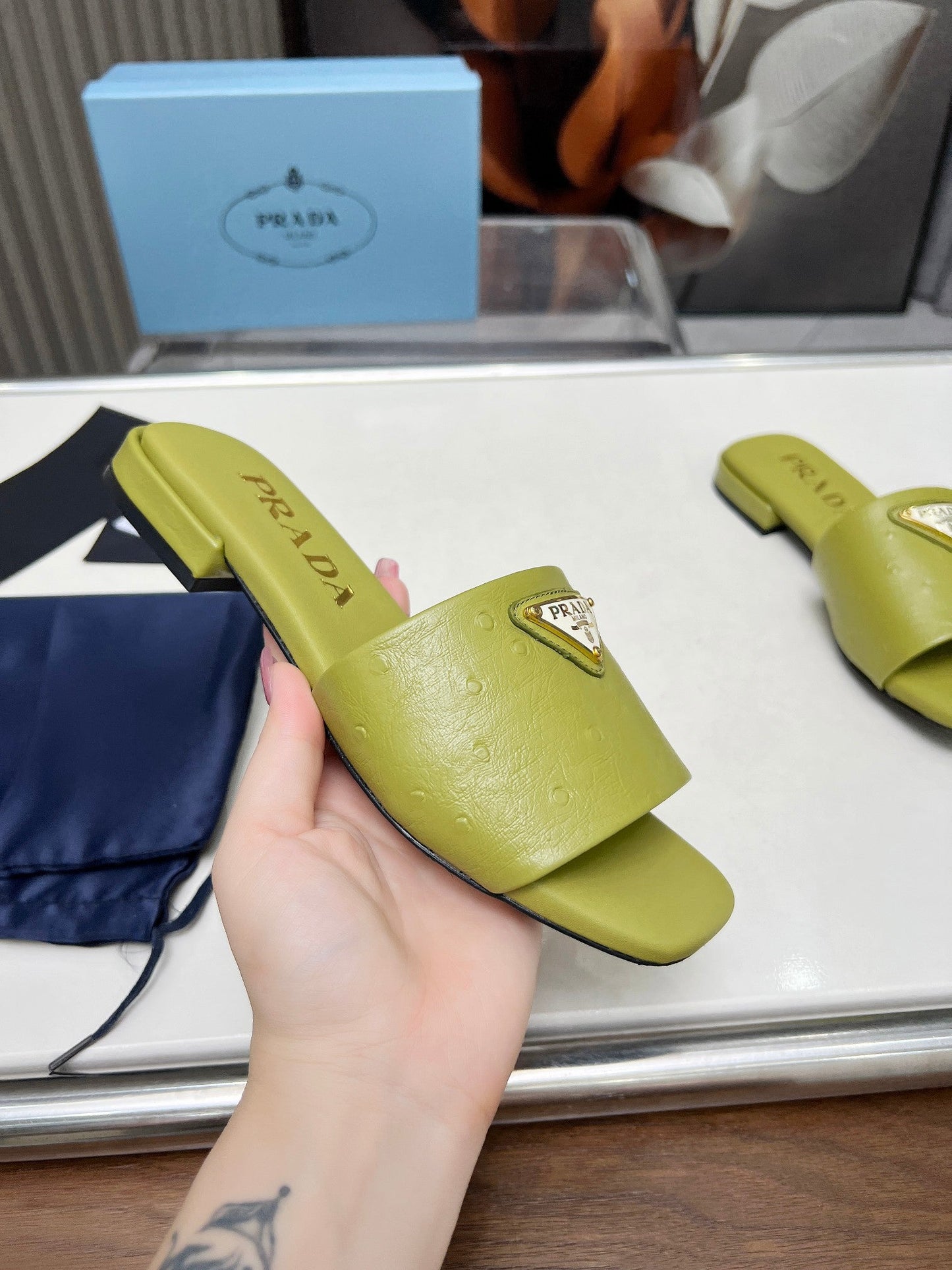 PRA SAFFIANO PATENT SLIDES OSTRICH MOTIF PEAR CALFSKIN - 35