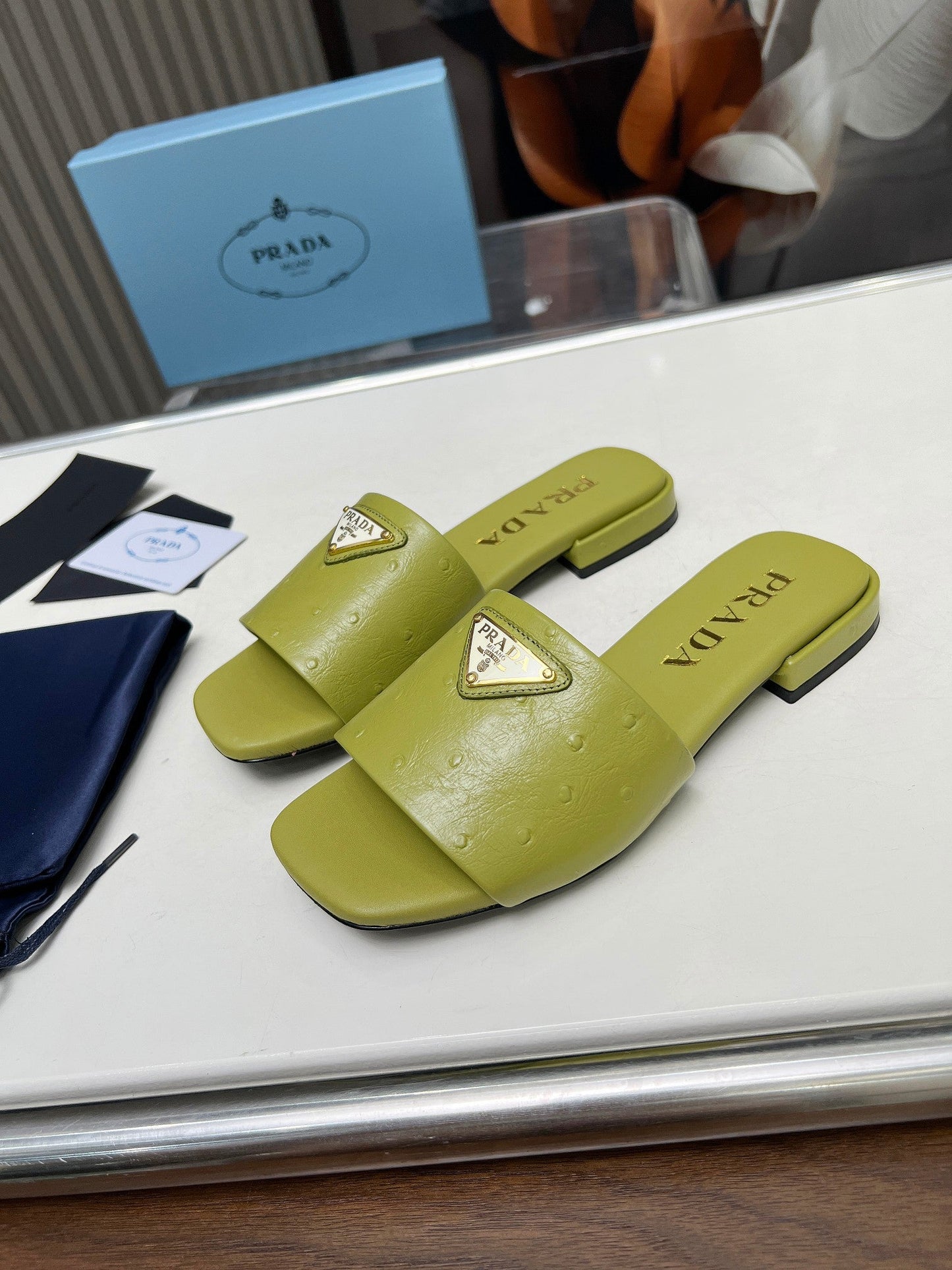 PRA SAFFIANO PATENT SLIDES OSTRICH MOTIF PEAR CALFSKIN - 35