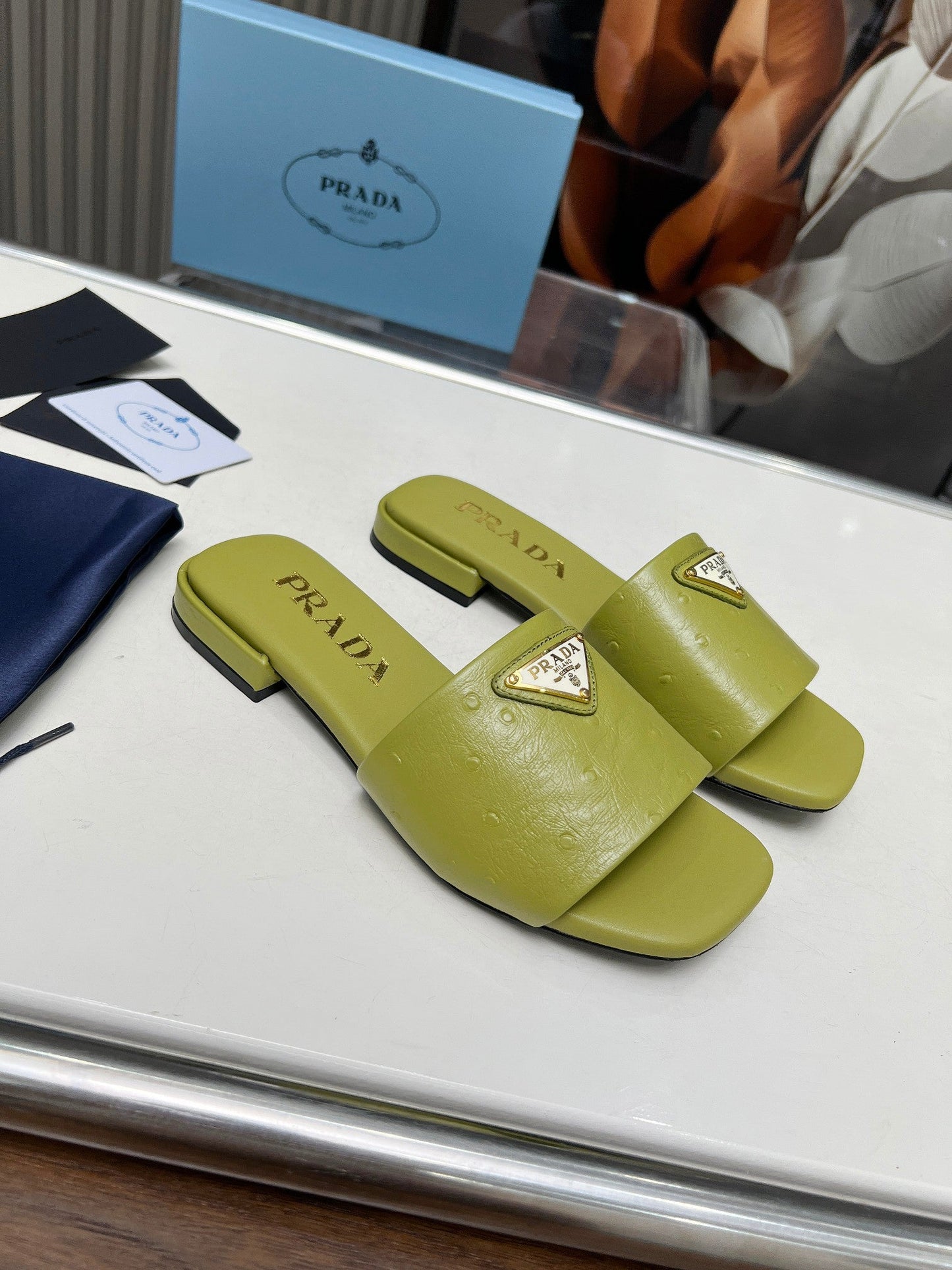 PRA SAFFIANO PATENT SLIDES OSTRICH MOTIF PEAR CALFSKIN - 35