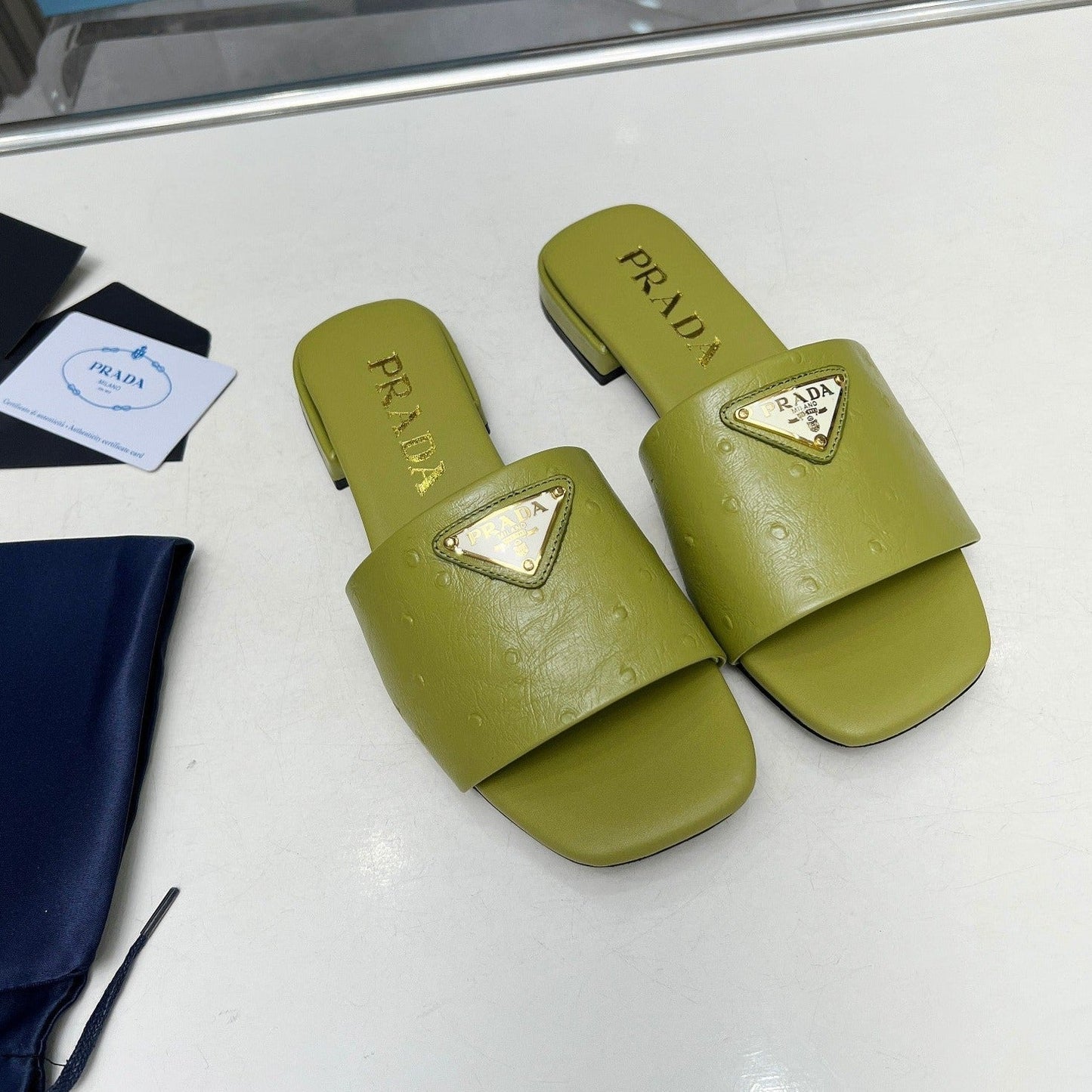 PRA SAFFIANO PATENT SLIDES OSTRICH MOTIF PEAR CALFSKIN - 35