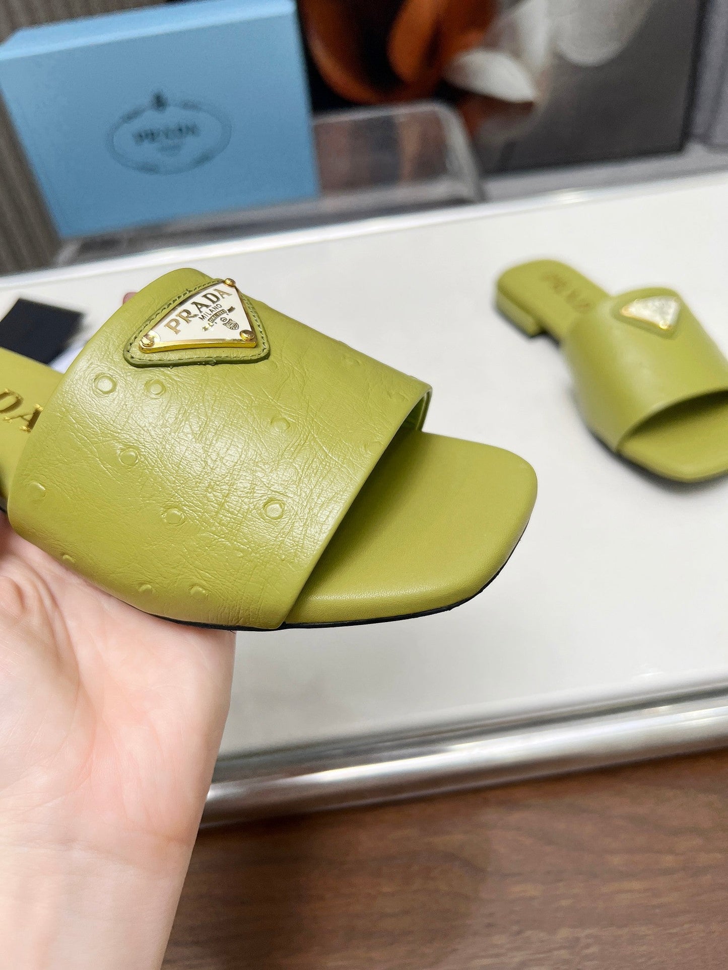 PRA SAFFIANO PATENT SLIDES OSTRICH MOTIF PEAR CALFSKIN - 35