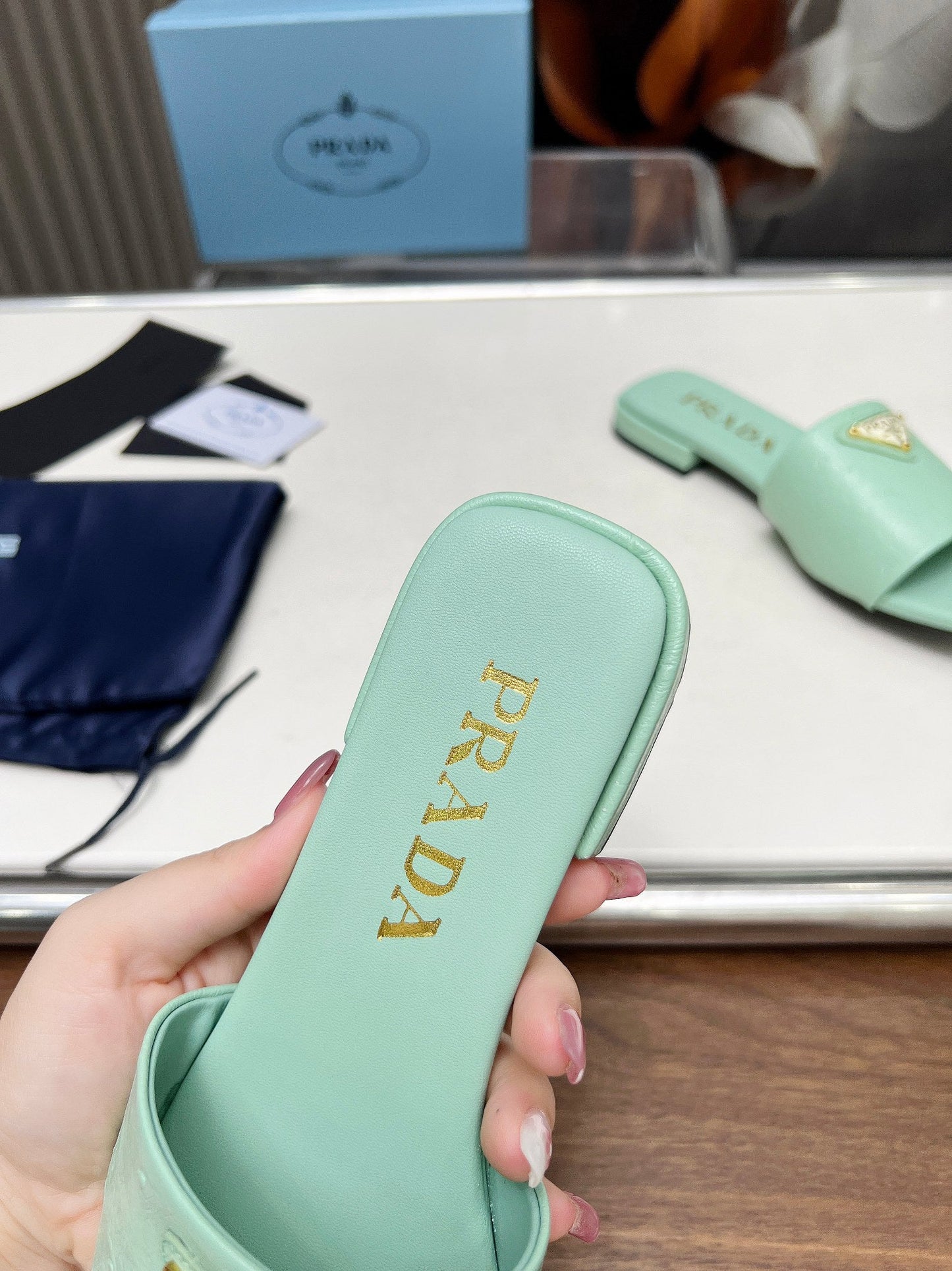 PRA SAFFIANO PATENT SLIDES OSTRICH MOTIF SEAFOAM CALFSKIN - 35