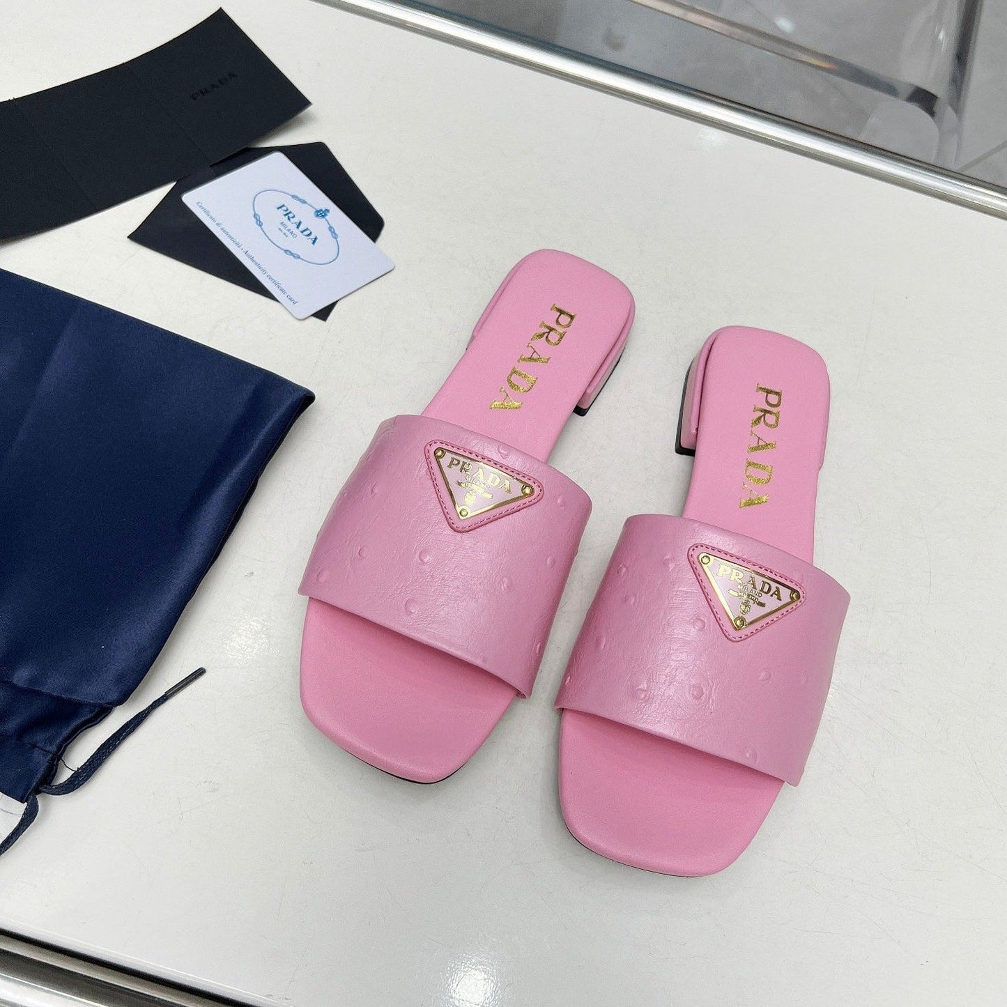 PRA SAFFIANO PATENT SLIDES OSTRICH MOTIF PINK CALFSKIN - 35