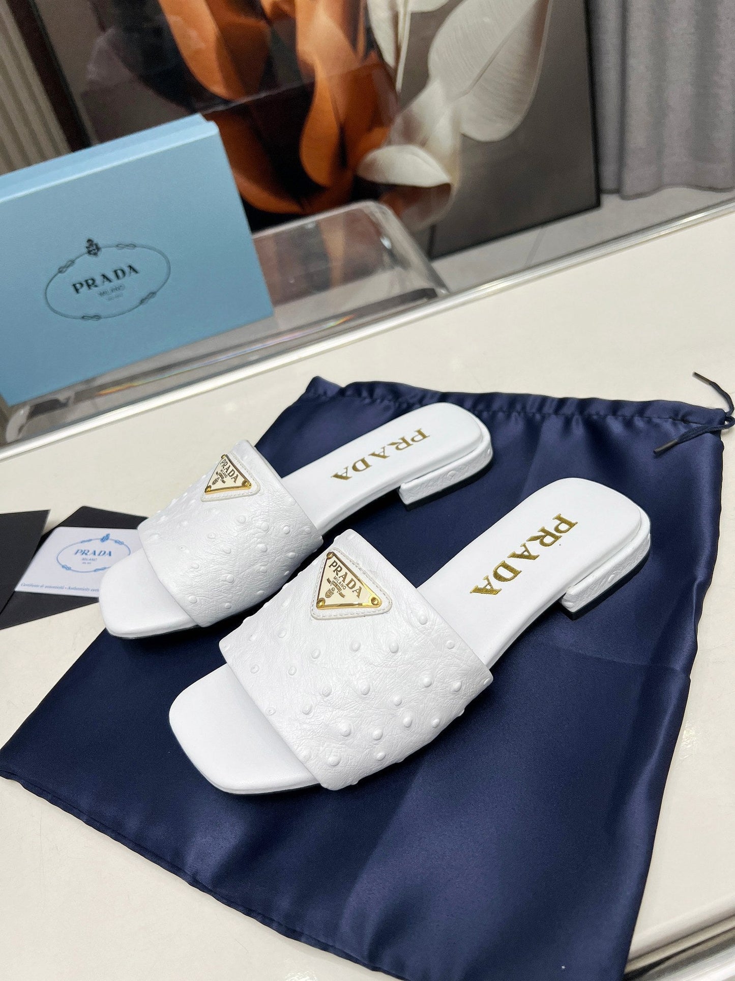 PRA SAFFIANO PATENT SLIDES OSTRICH MOTIF WHITE CALFSKIN - 35
