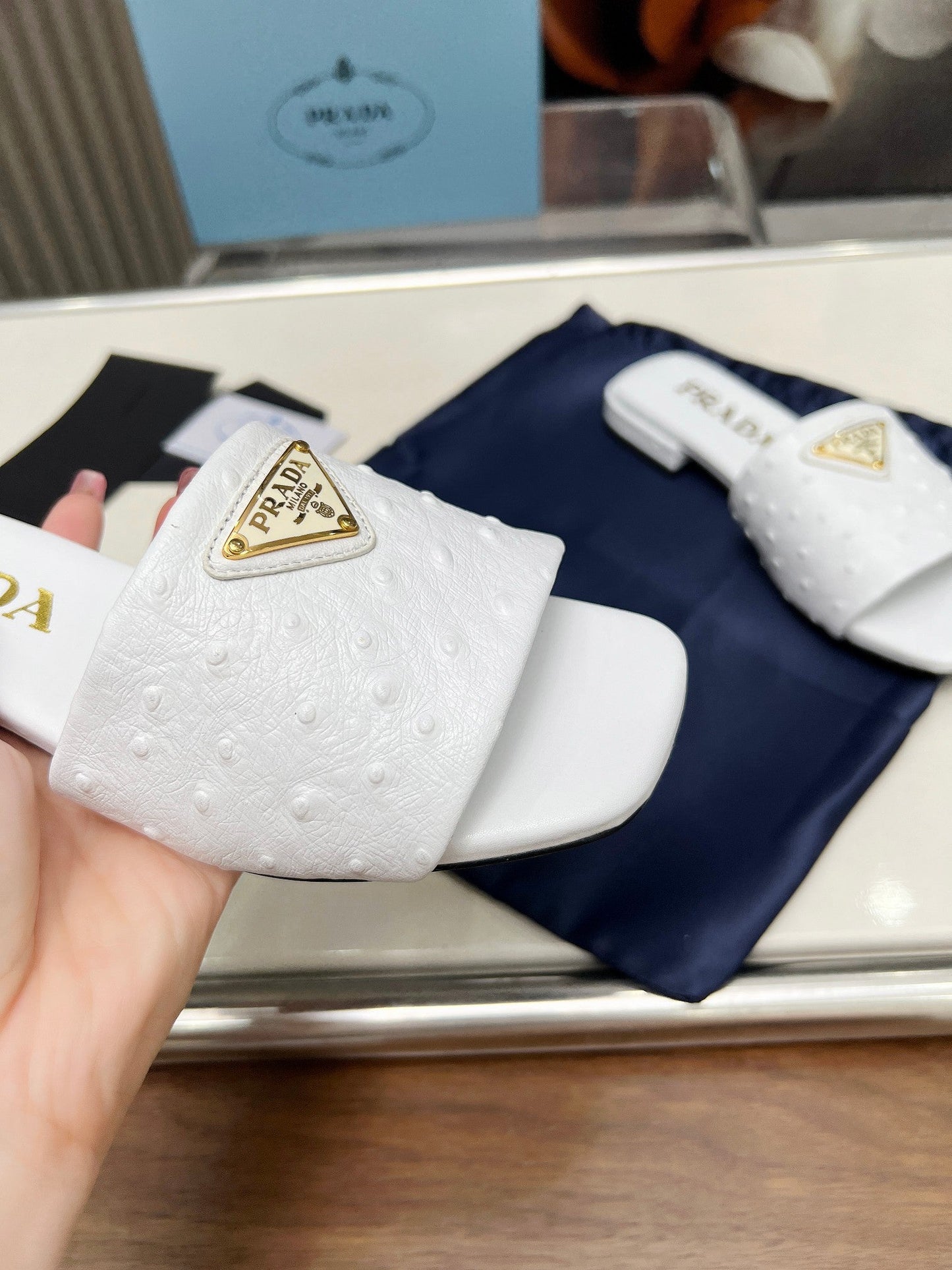 PRA SAFFIANO PATENT SLIDES OSTRICH MOTIF WHITE CALFSKIN - 35
