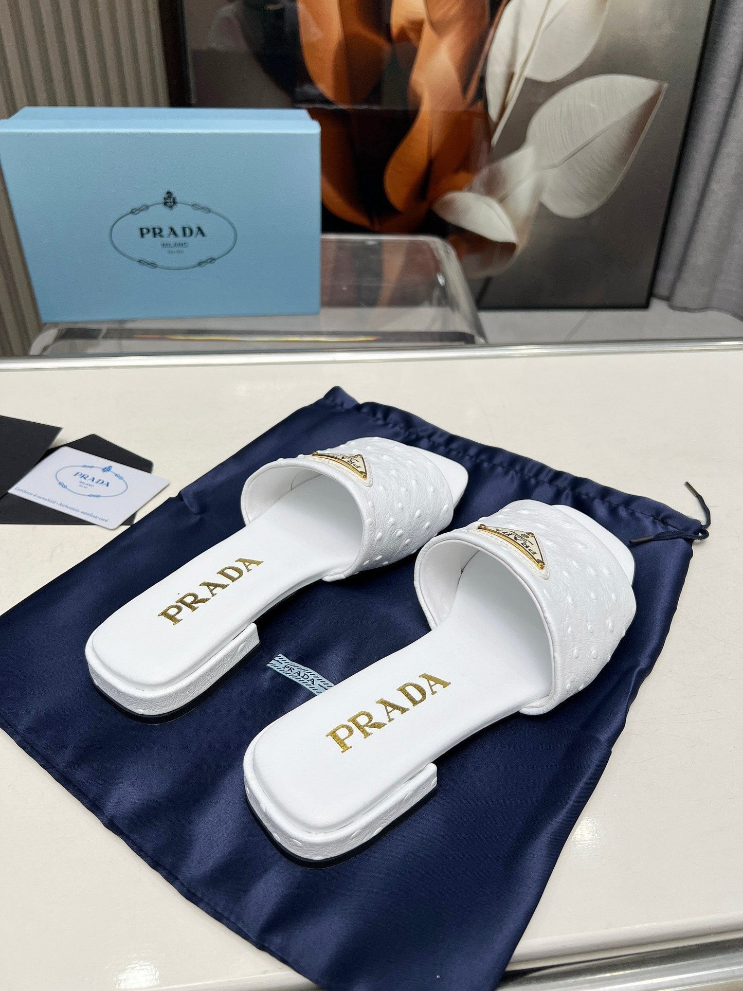 PRA SAFFIANO PATENT SLIDES OSTRICH MOTIF WHITE CALFSKIN - 35