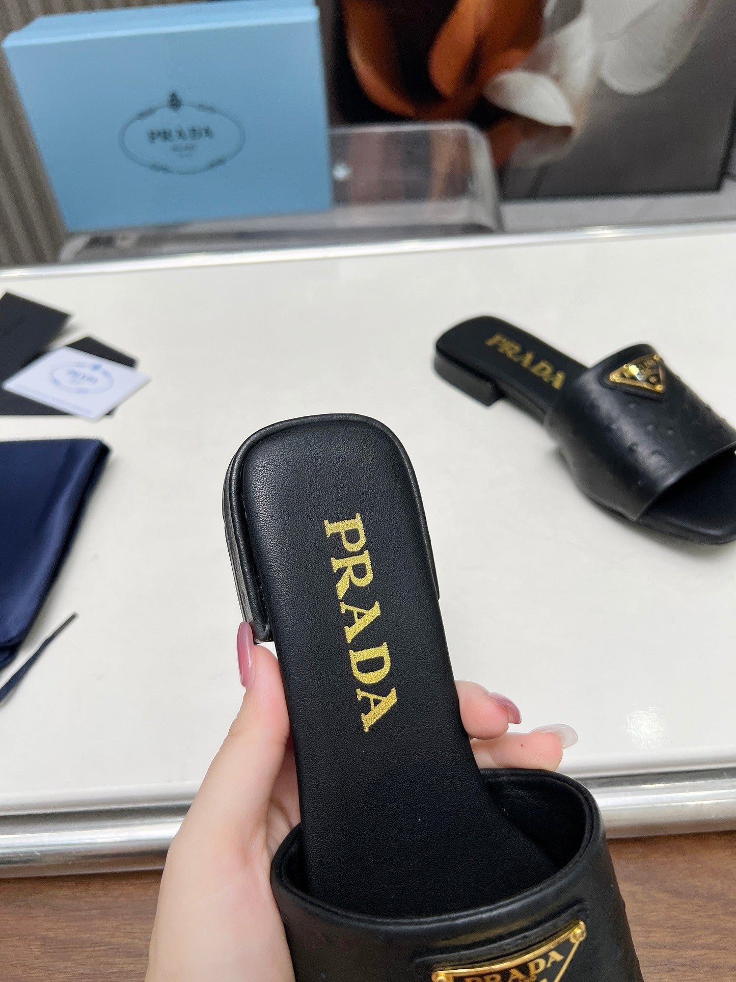 PRA SAFFIANO PATENT SLIDES OSTRICH MOTIF BLACK CALFSKIN - 35