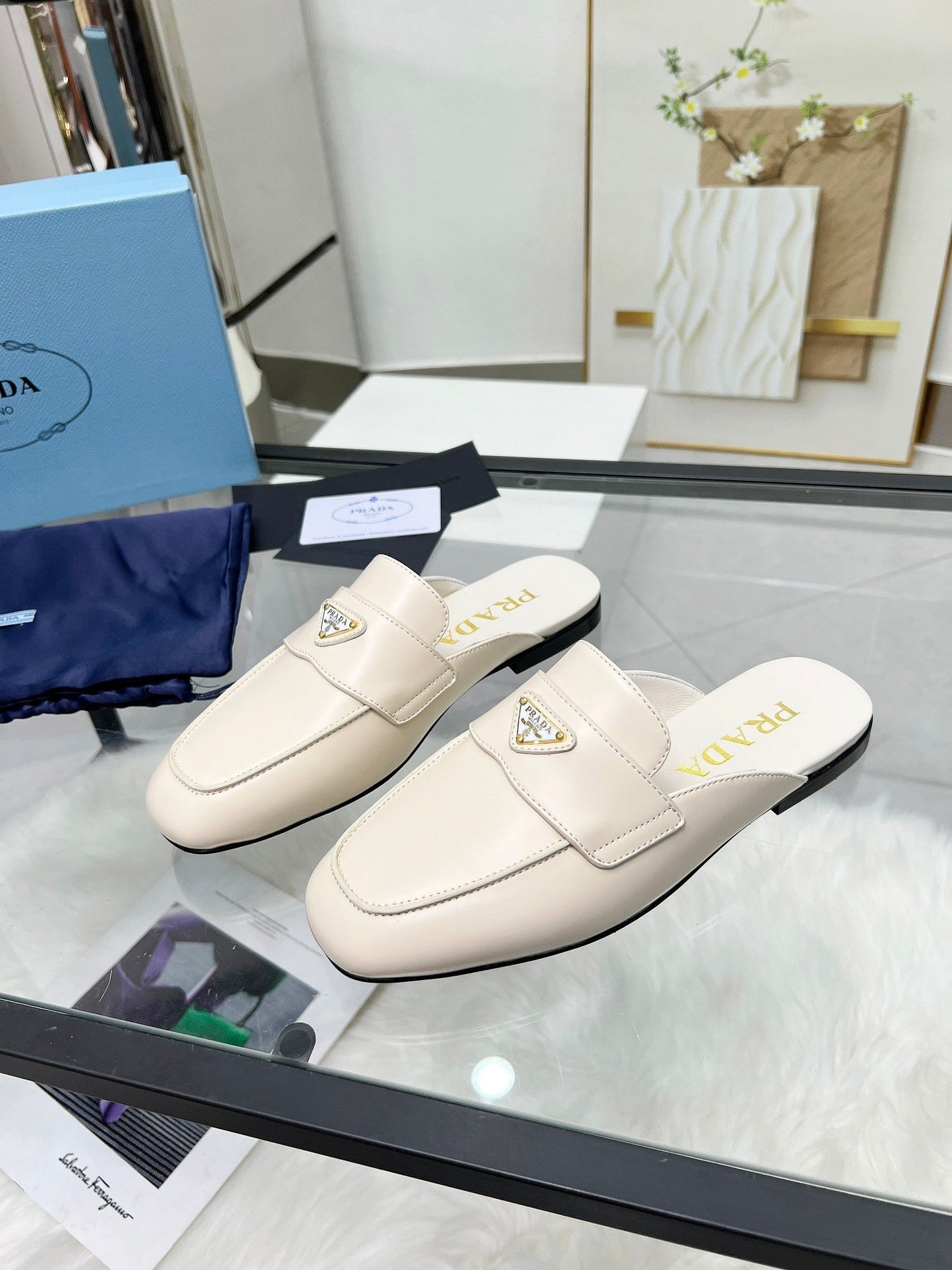 TRIANGLE LOGO MULES IN WHITE CALFSKIN - 35