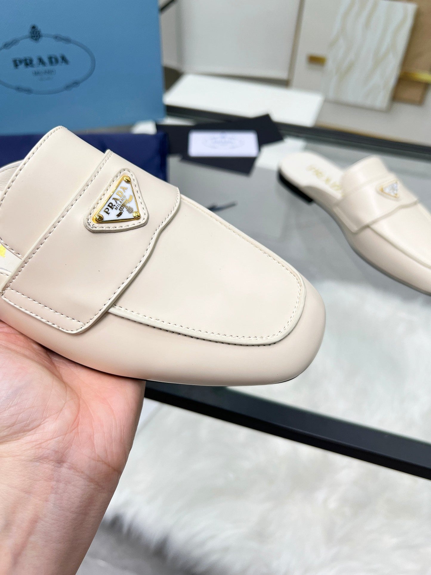 TRIANGLE LOGO MULES IN WHITE CALFSKIN - 35