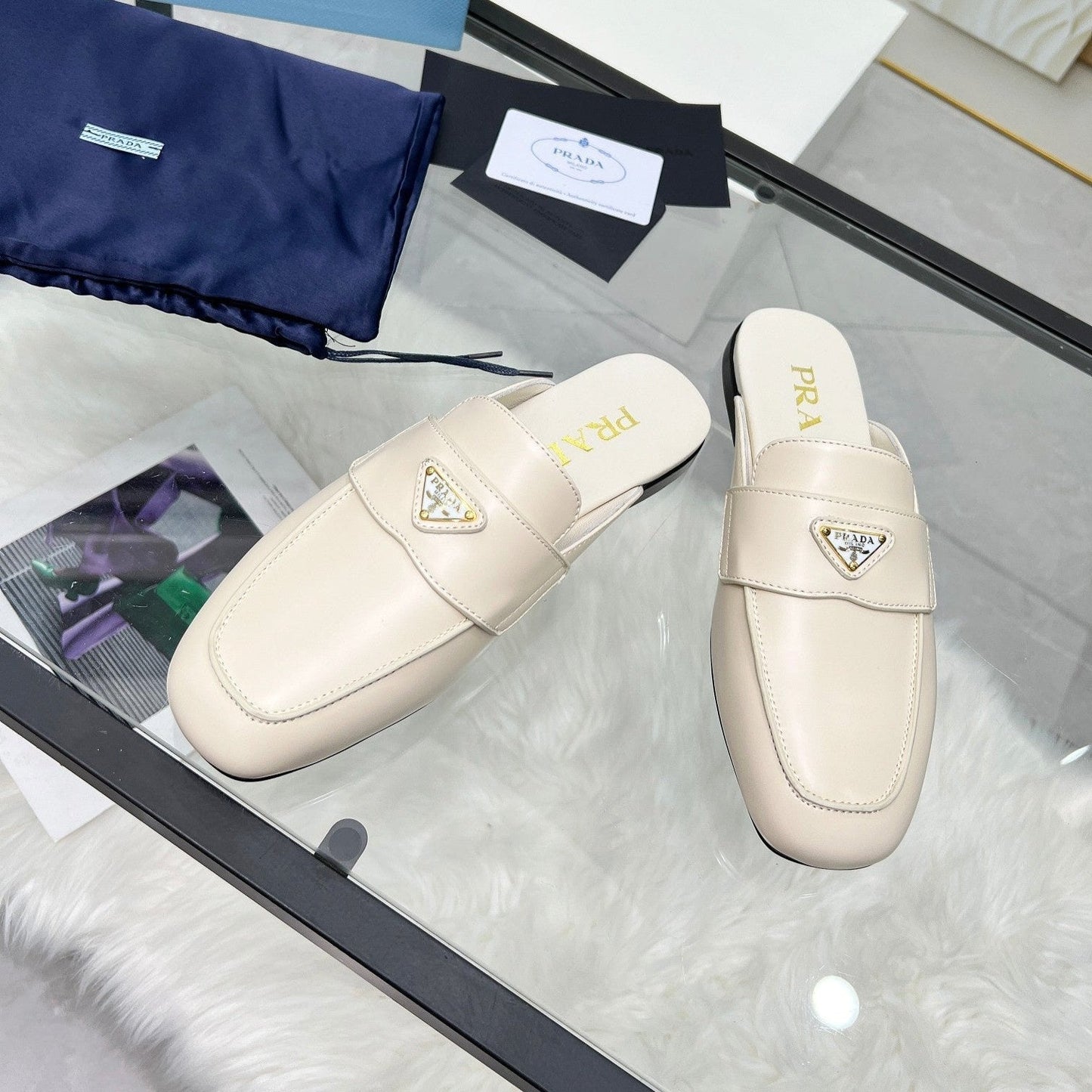 TRIANGLE LOGO MULES IN WHITE CALFSKIN - 35