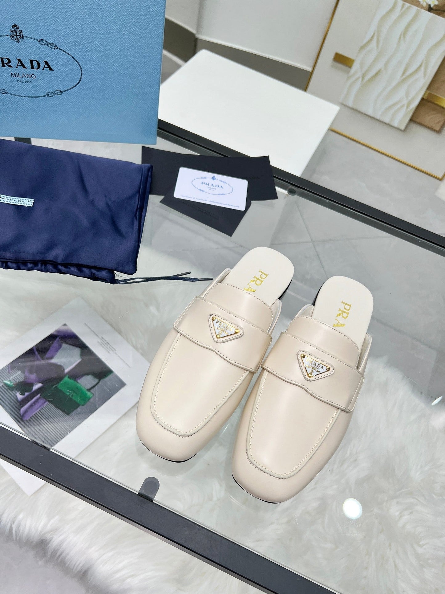 TRIANGLE LOGO MULES IN WHITE CALFSKIN - 35