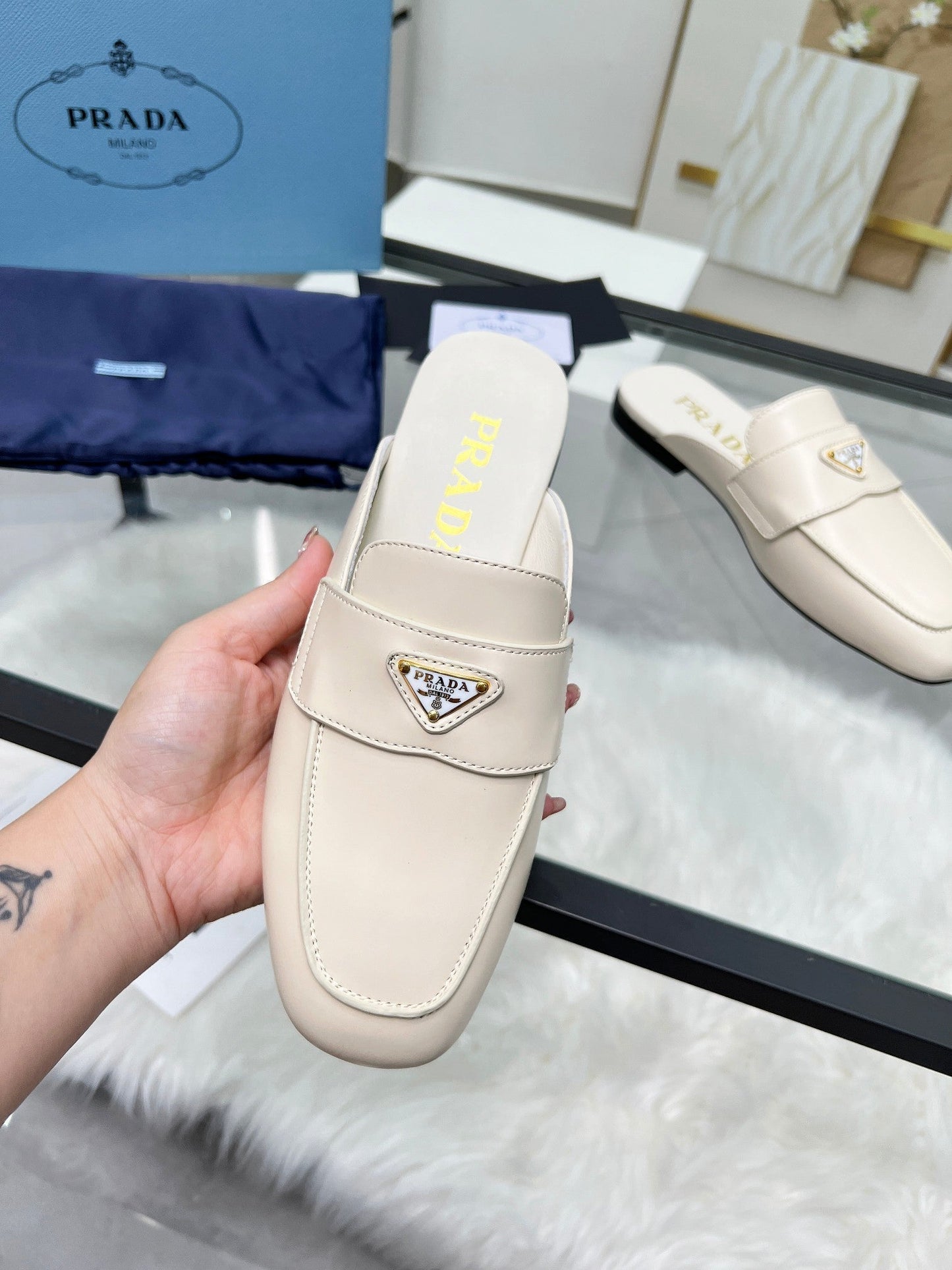 TRIANGLE LOGO MULES IN WHITE CALFSKIN - 35