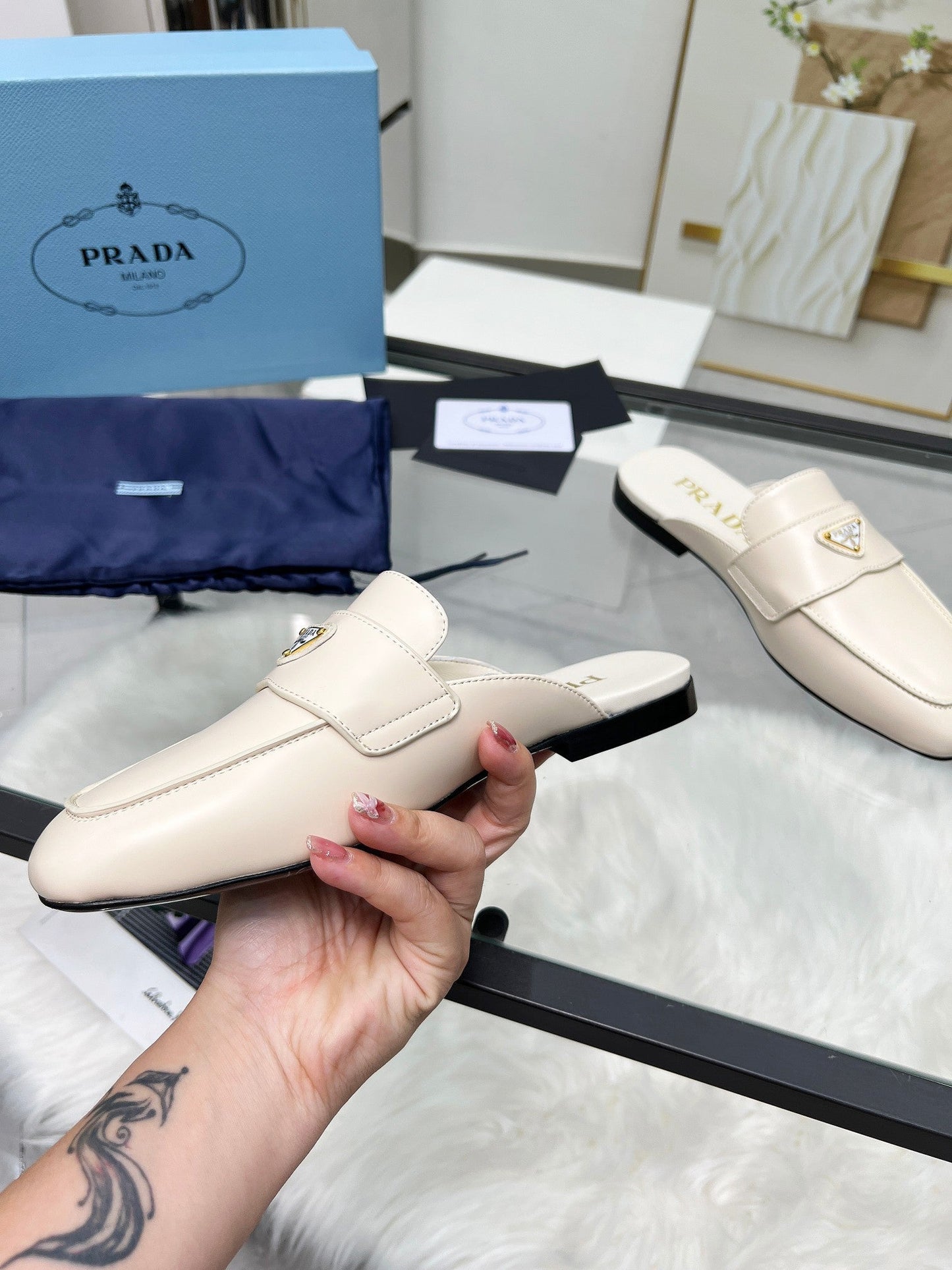 TRIANGLE LOGO MULES IN WHITE CALFSKIN - 35