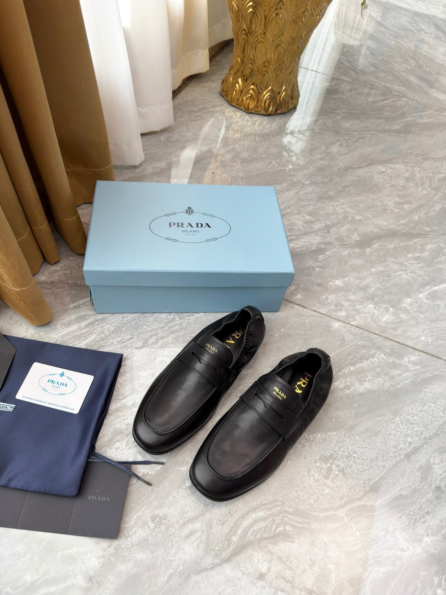 PRADA 25S LOAFERS IN BLACK CALFSKIN - 35