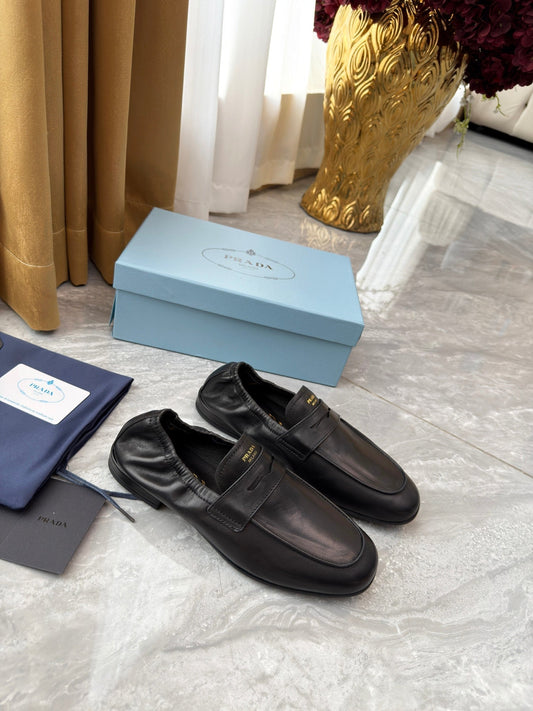 PRADA 25S LOAFERS IN BLACK CALFSKIN - 35