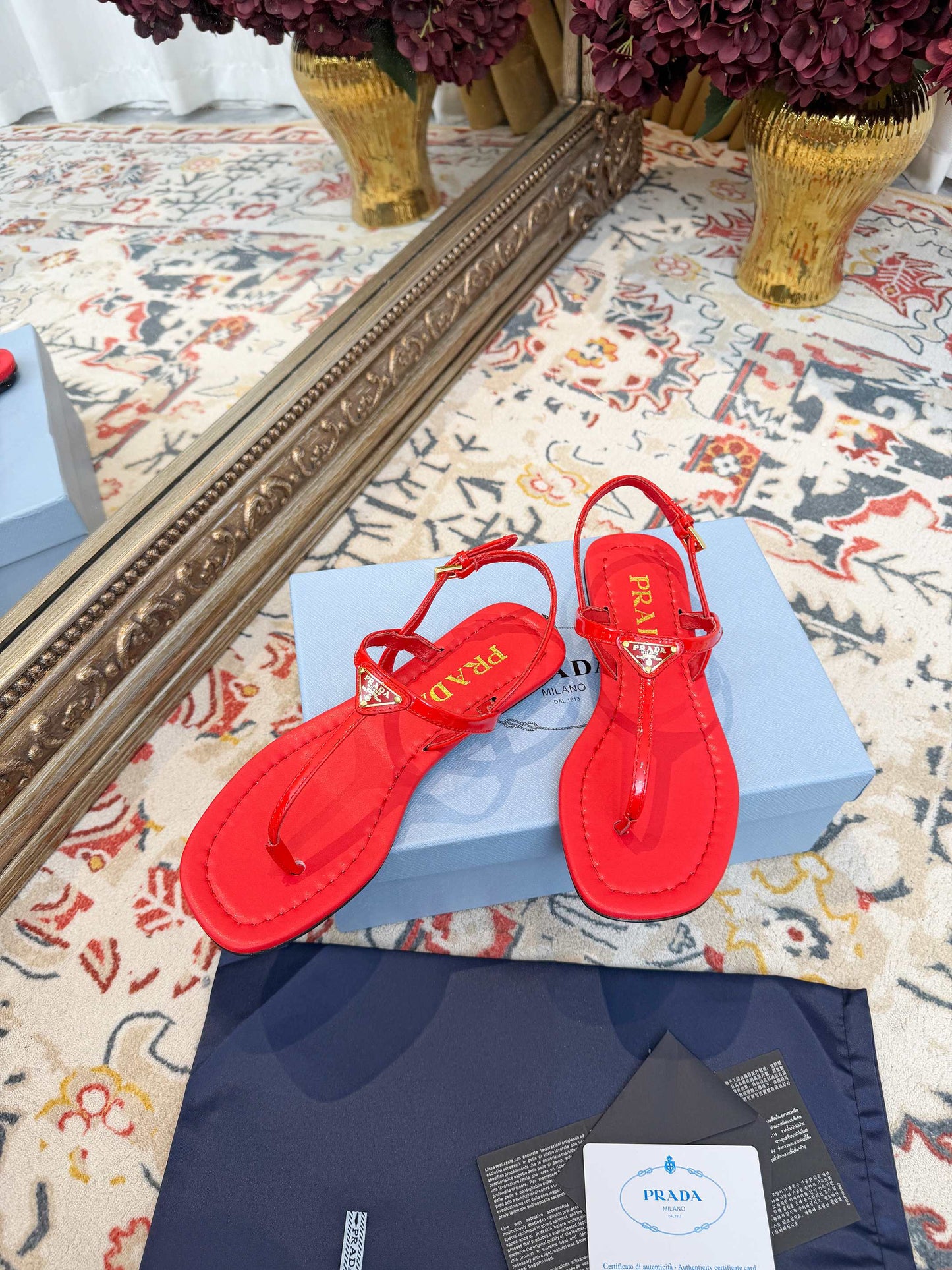 PRADA 26S THONG SANDALS IN RED CALFSKIN TRIANGLE LOGO