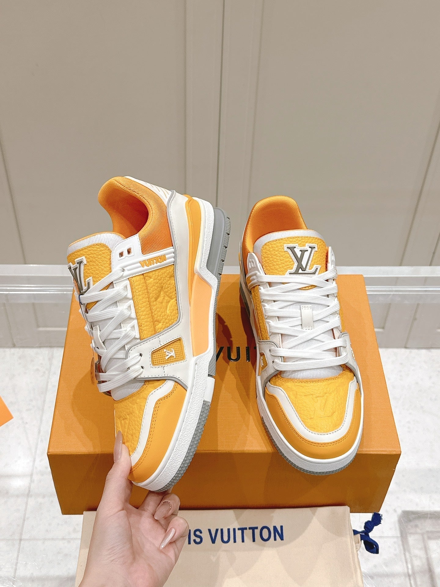 LV TRAINER SNEAKER IN SAFFRAN YELLOW GRAINED CALFSKIN - 35