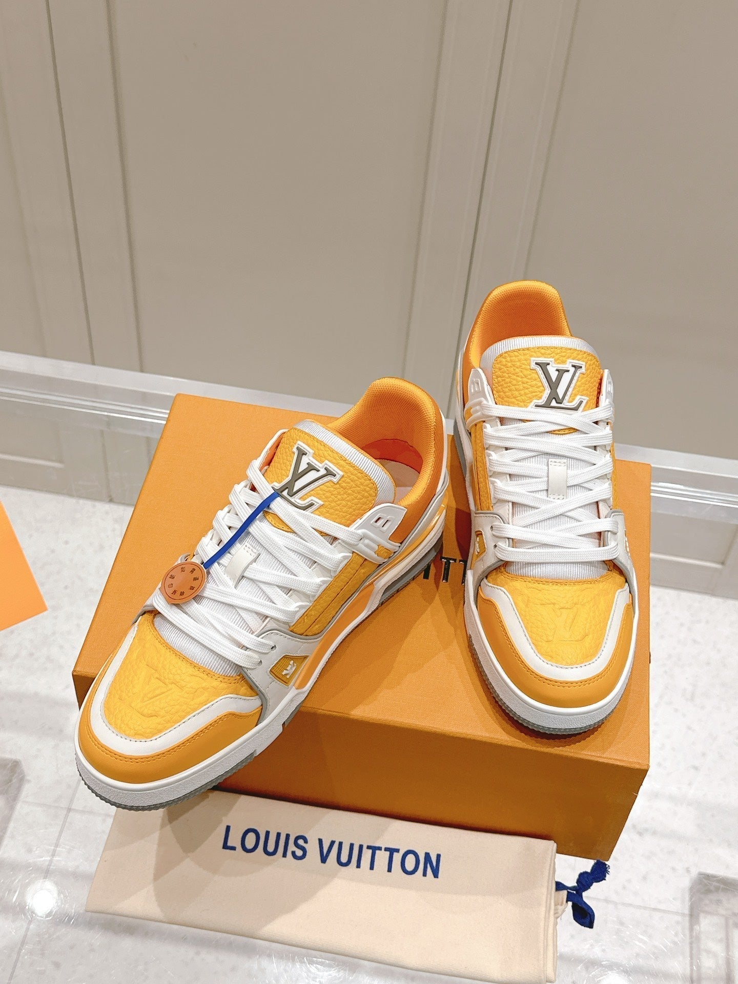 LV TRAINER SNEAKER IN SAFFRAN YELLOW GRAINED CALFSKIN - 35