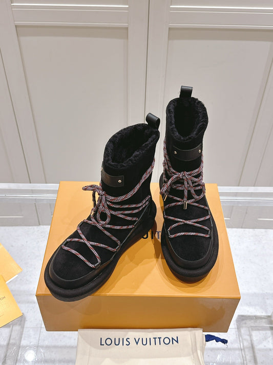 ASPEN PLATFORM ANKLE BOOT IN BLACK MONOGRAM DEBOSSED SUEDE AND SHEARLING - 35
