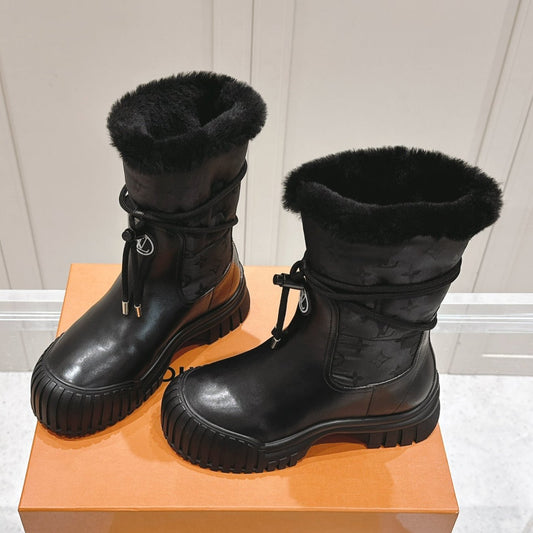 RUBY FLAT ANKLE BOOT IN BLACK CALFSKIN AND MONOGRAM NYLON - 35
