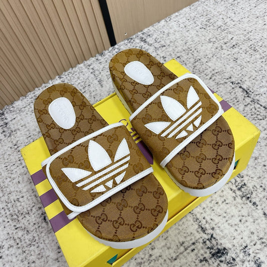 ШЛЬОПАНЦІ-ПЛАТФОРМИ GUCCI 26S З КОРИЧНЕВОГО КАНВАСУ GG