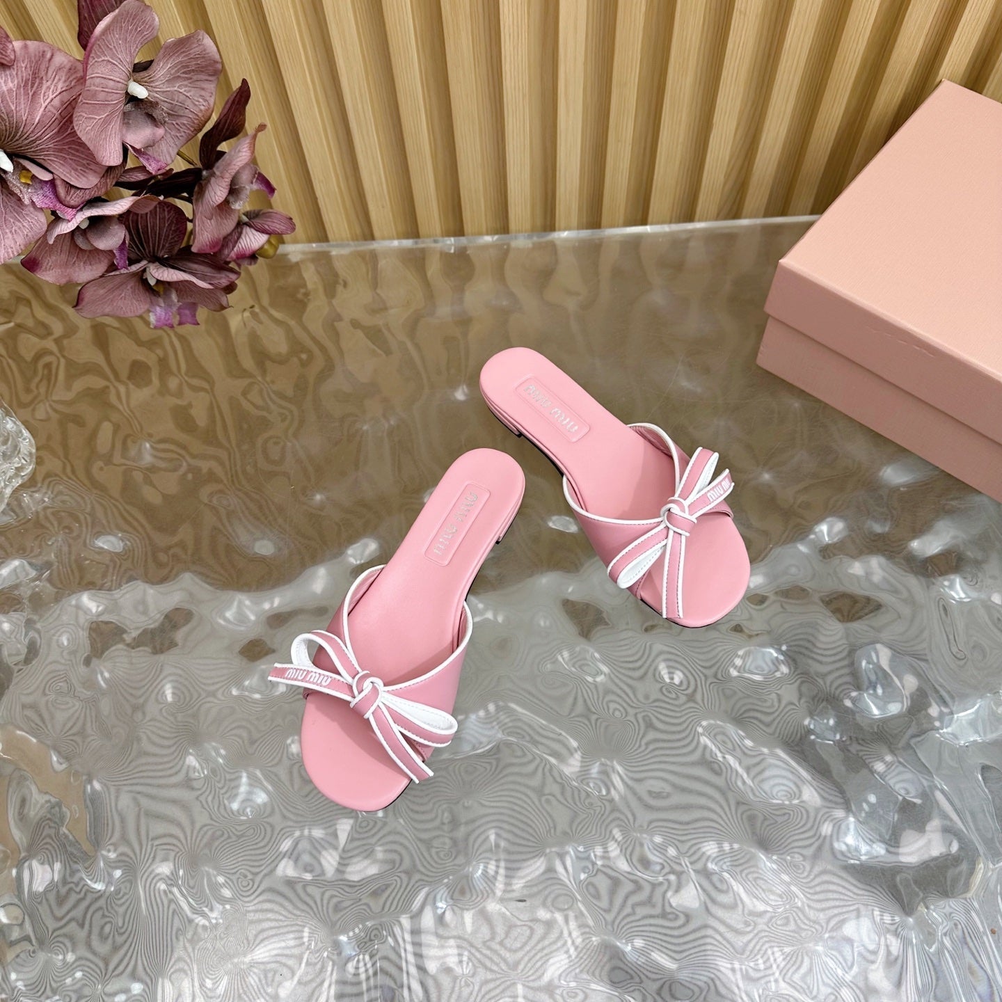 SLIDES SANDALS IN PINK CALFSKIN WITH BOW IN TRAP - 35