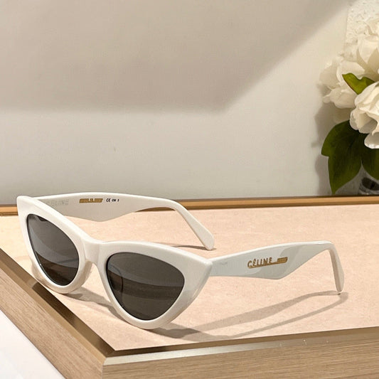 СОНЦЕЗАХИСНІ ОКУЛЯРИ TRIOMPHE CAT EYE CL40019 З АЦЕТАТУ - Сині