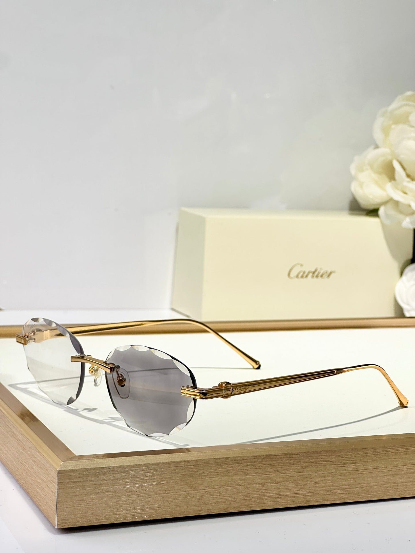C DE RIMLESS ROUND FRAME SUNGLASSES CT0611S IN METAL - Brown photochromic lenses