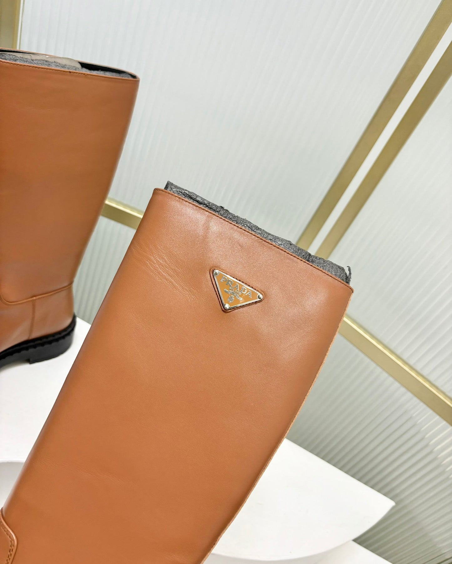 KNEE BOOTS WITH TRIANGLE LOGO IN CAMEL CALFSKIN - 35