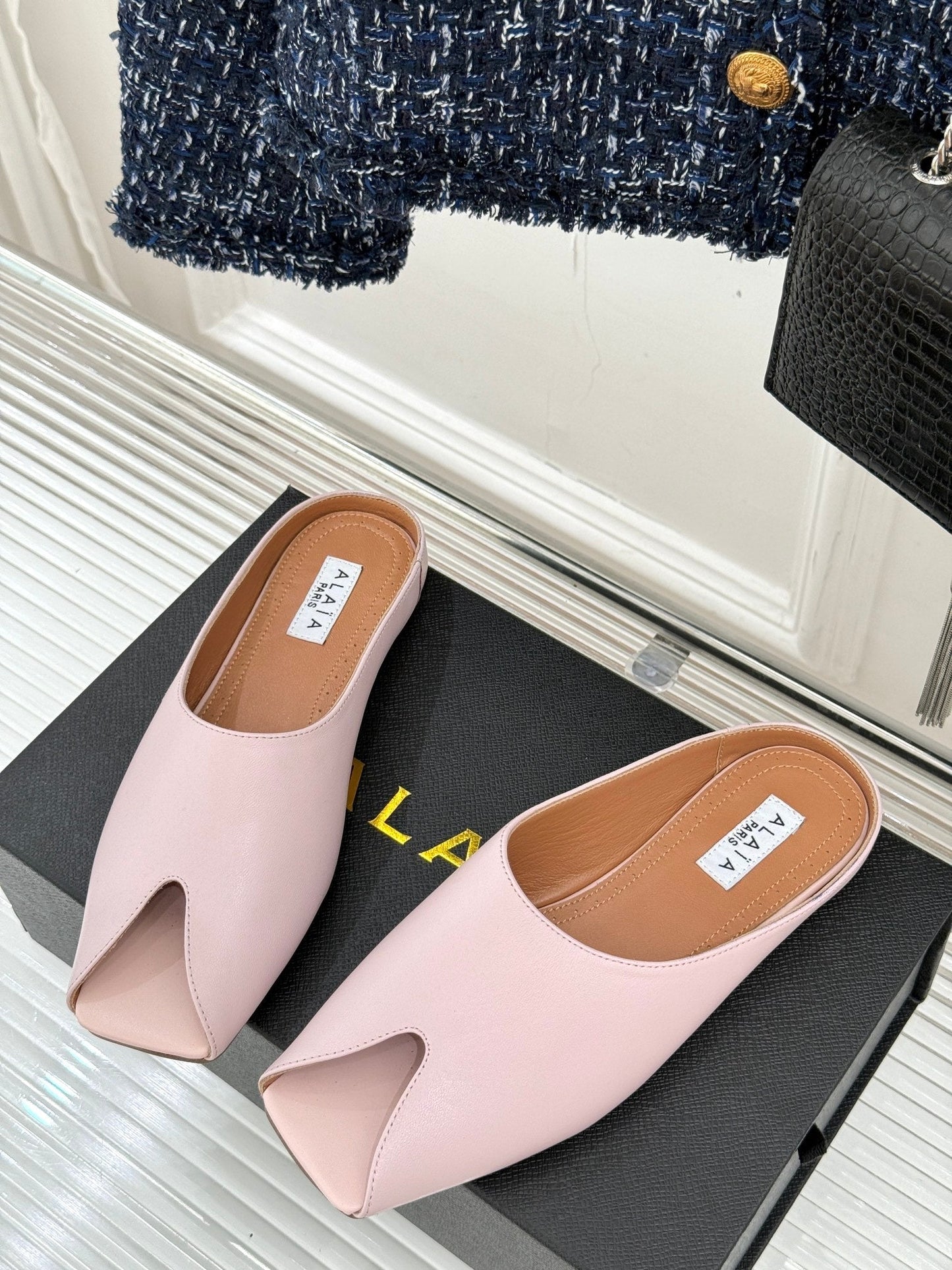 ALAIA FLAT MULE IN LIGHT PINK LAMBSKIN - 35