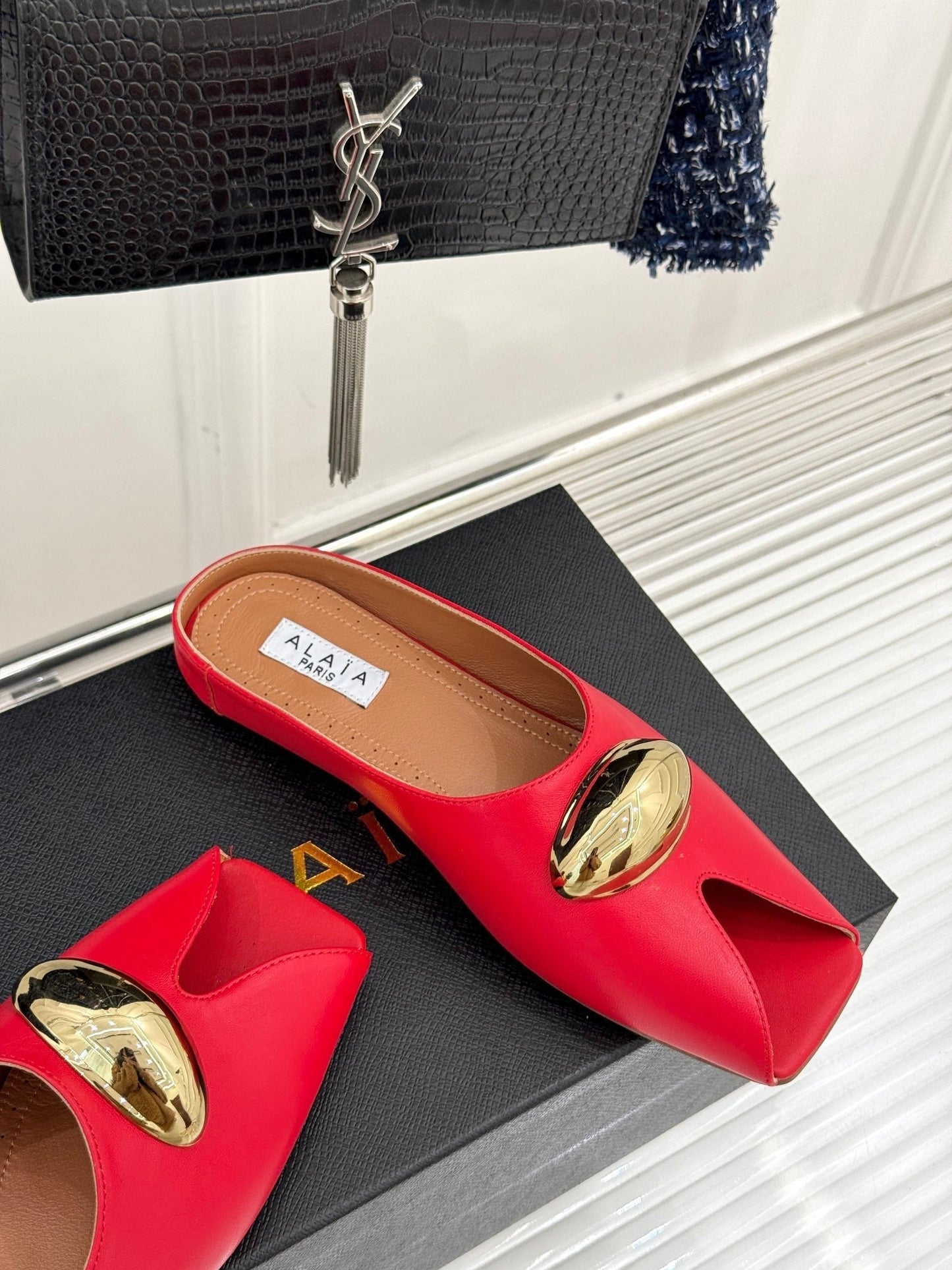 ALAIA FLAT MULE IN CRIMSON RED LAMBSKIN WITH GOLD HARDWARE - 35