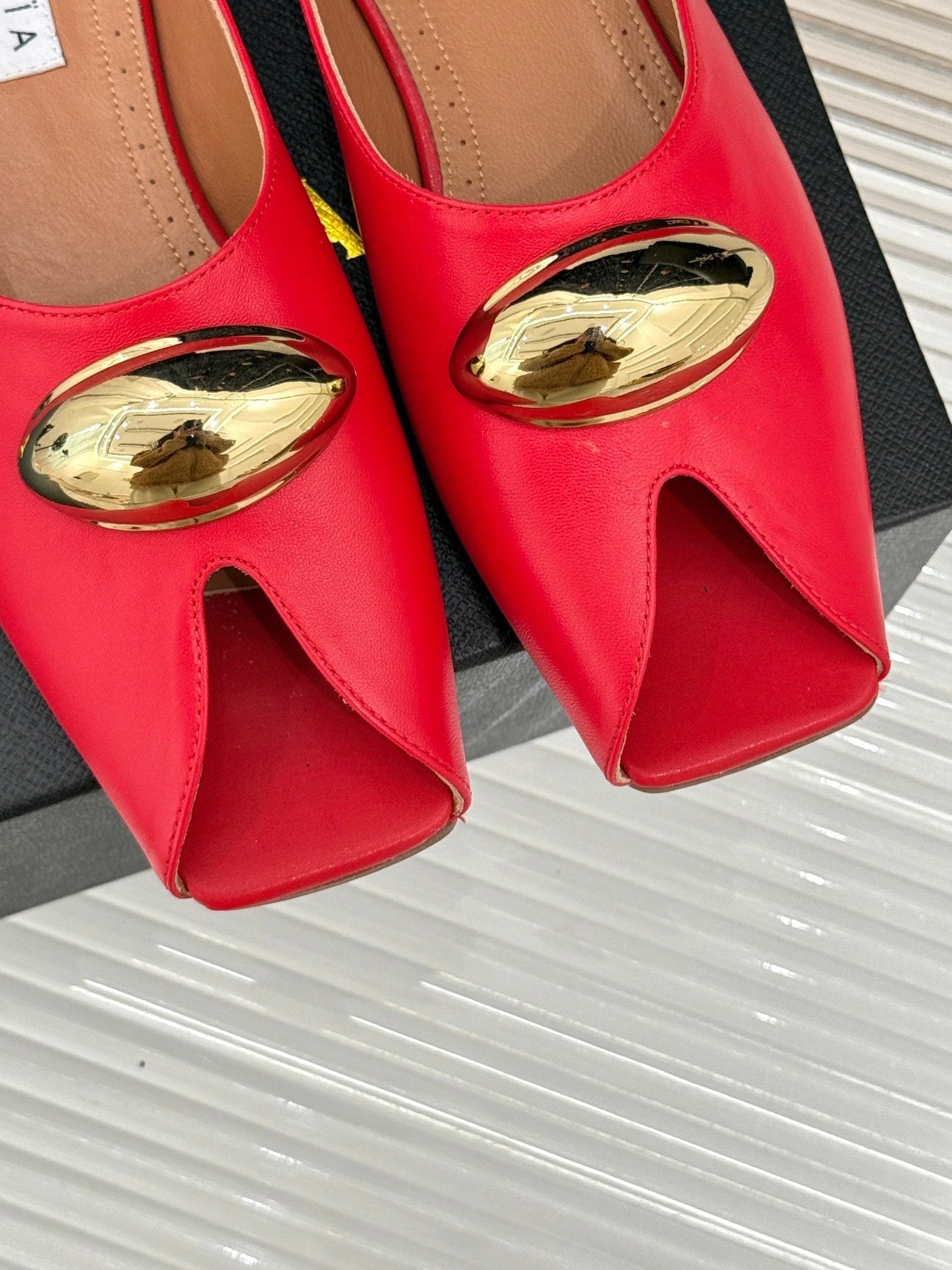 ALAIA FLAT MULE IN CRIMSON RED LAMBSKIN WITH GOLD HARDWARE - 35