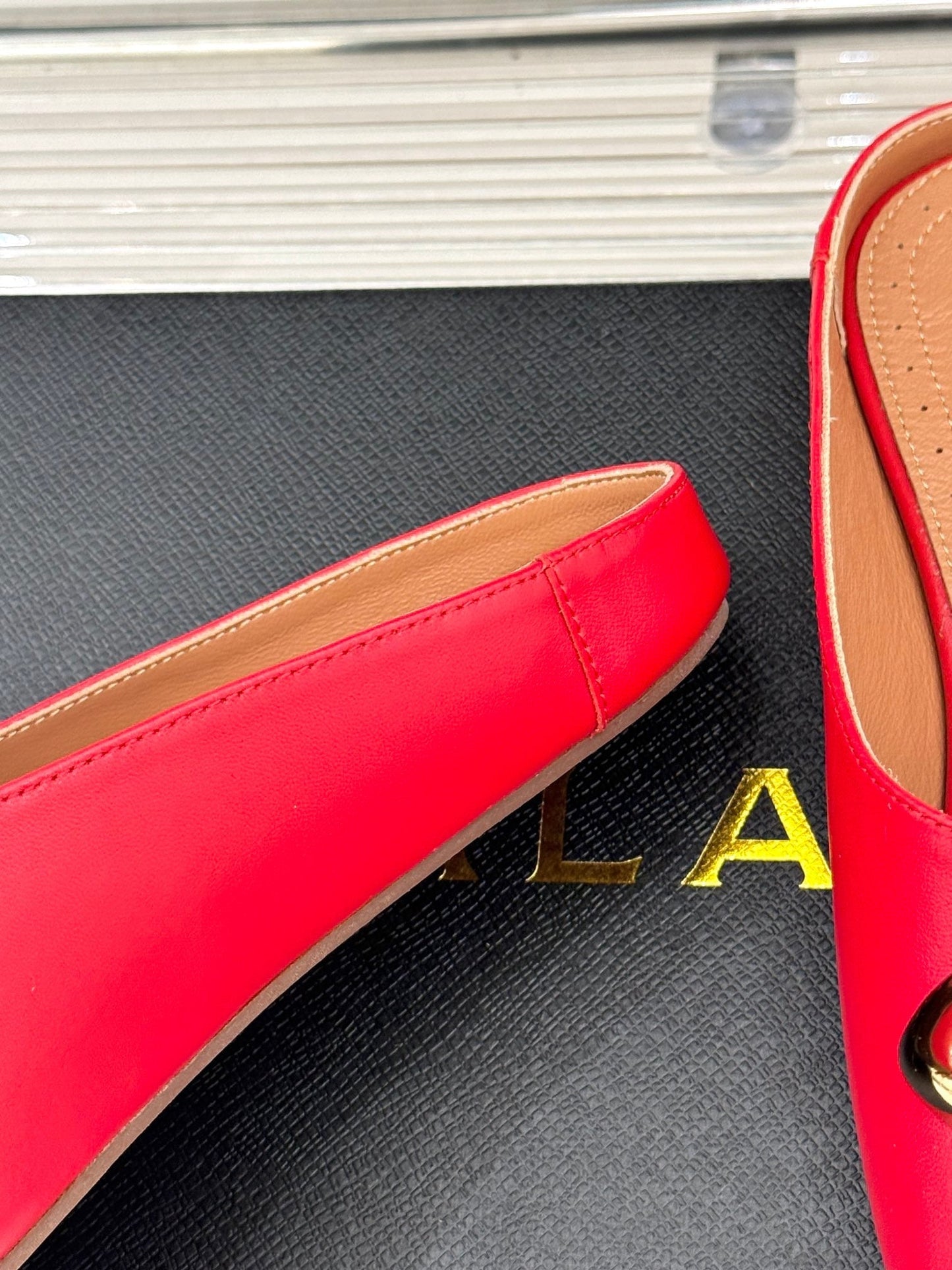 ALAIA FLAT MULE IN CRIMSON RED LAMBSKIN WITH GOLD HARDWARE - 35