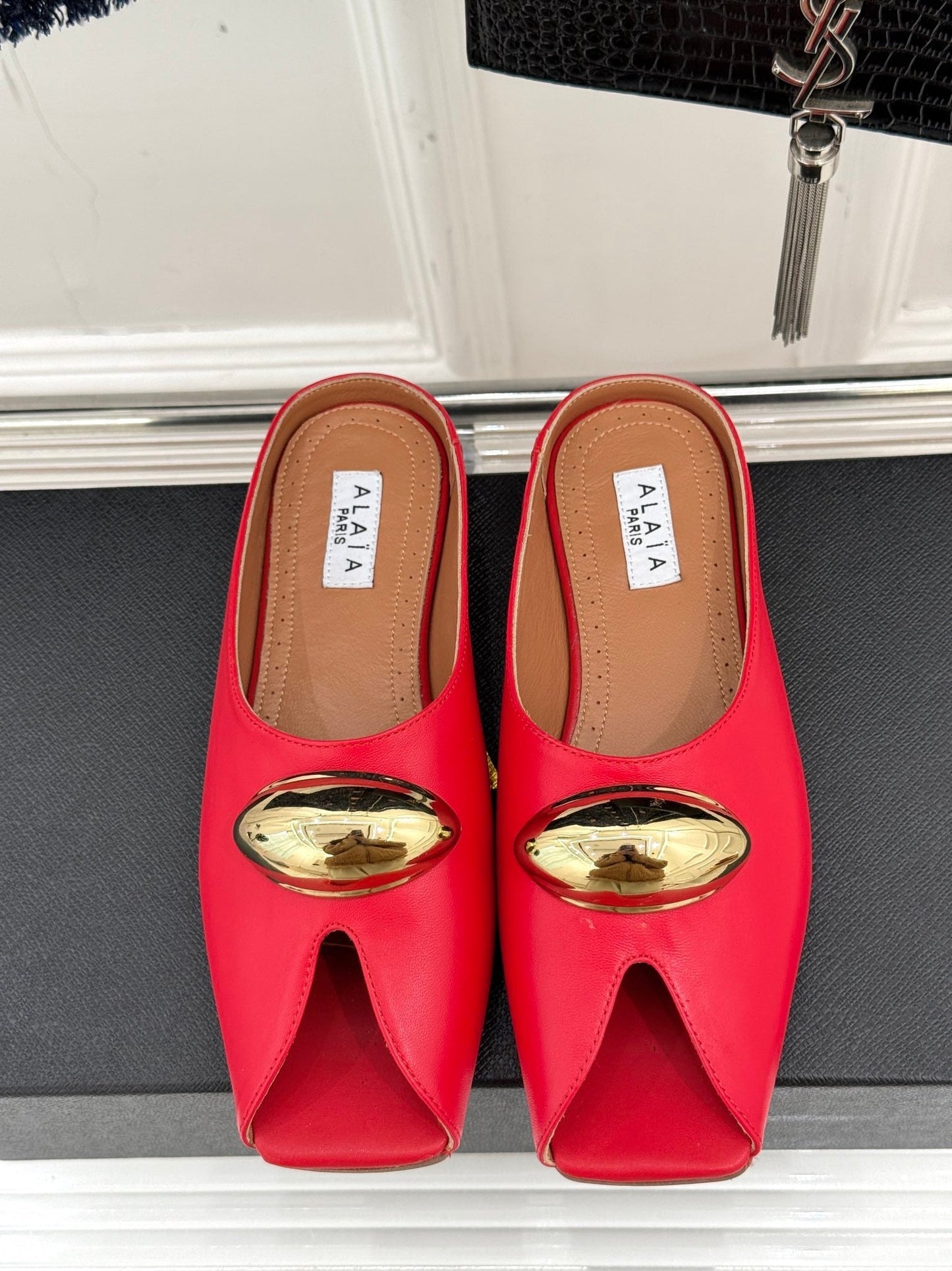 ALAIA FLAT MULE IN CRIMSON RED LAMBSKIN WITH GOLD HARDWARE - 35