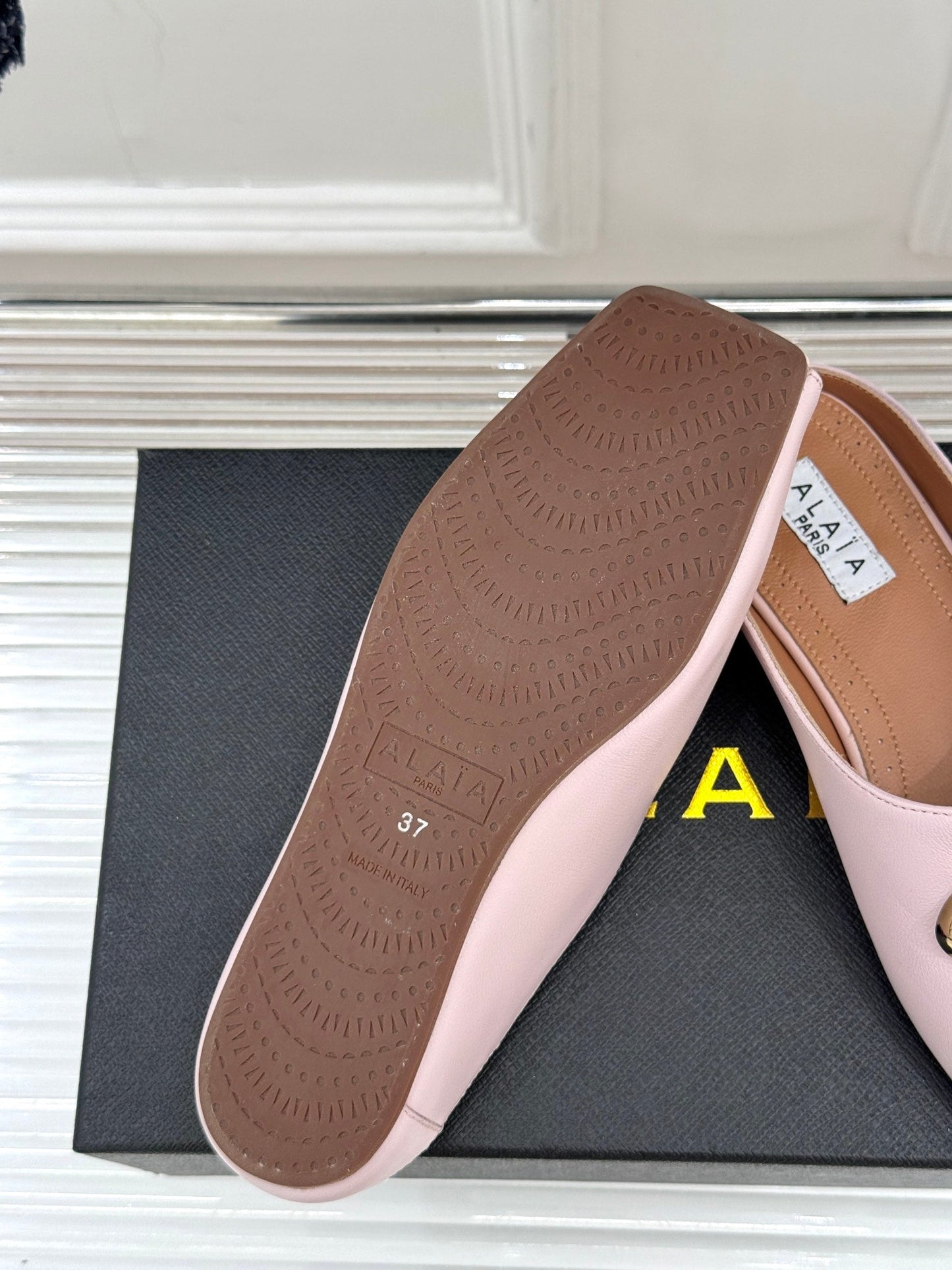 ALAIA FLAT MULE IN LIGHT PINK LAMBSKIN WITH GOLD HARDWARE - 35