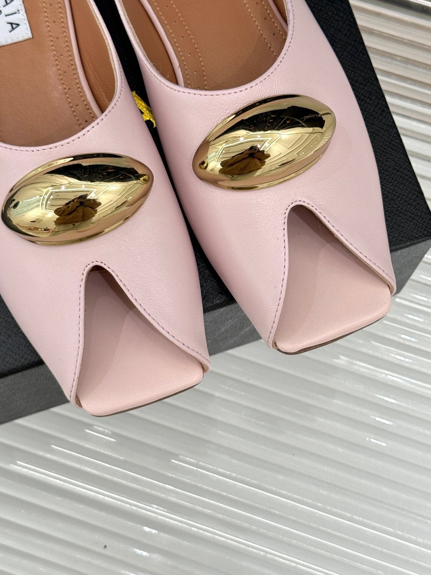 ALAIA FLAT MULE IN LIGHT PINK LAMBSKIN WITH GOLD HARDWARE - 35