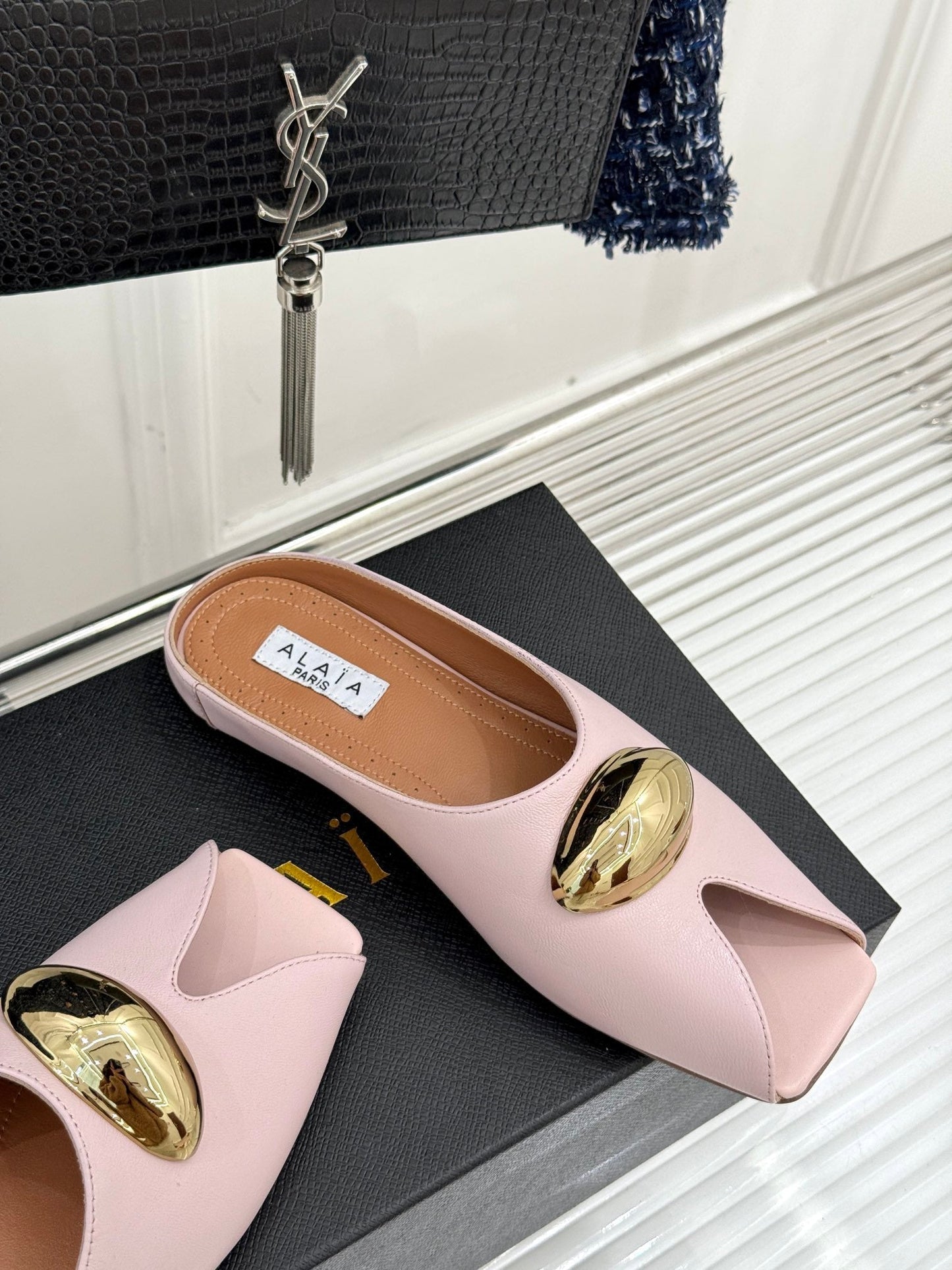 ALAIA FLAT MULE IN LIGHT PINK LAMBSKIN WITH GOLD HARDWARE - 35