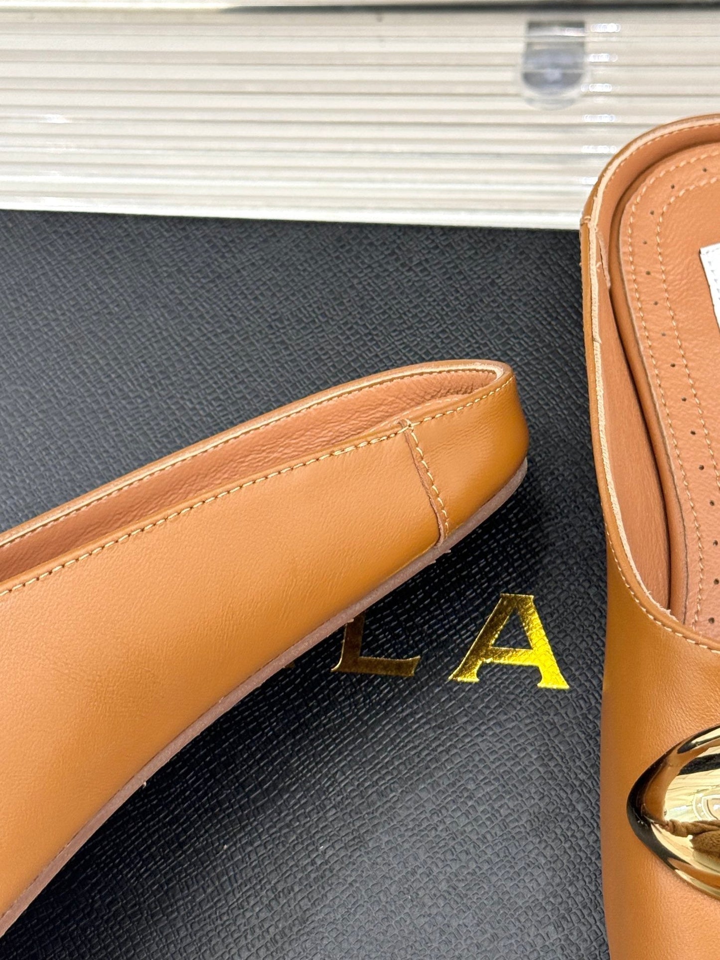ALAIA FLAT MULE IN BRONZE BROWN LAMBSKIN WITH GOLD HARDWARE - 35