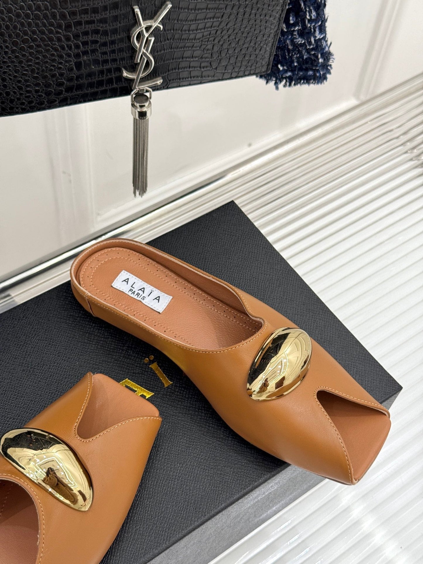 ALAIA FLAT MULE IN BRONZE BROWN LAMBSKIN WITH GOLD HARDWARE - 35