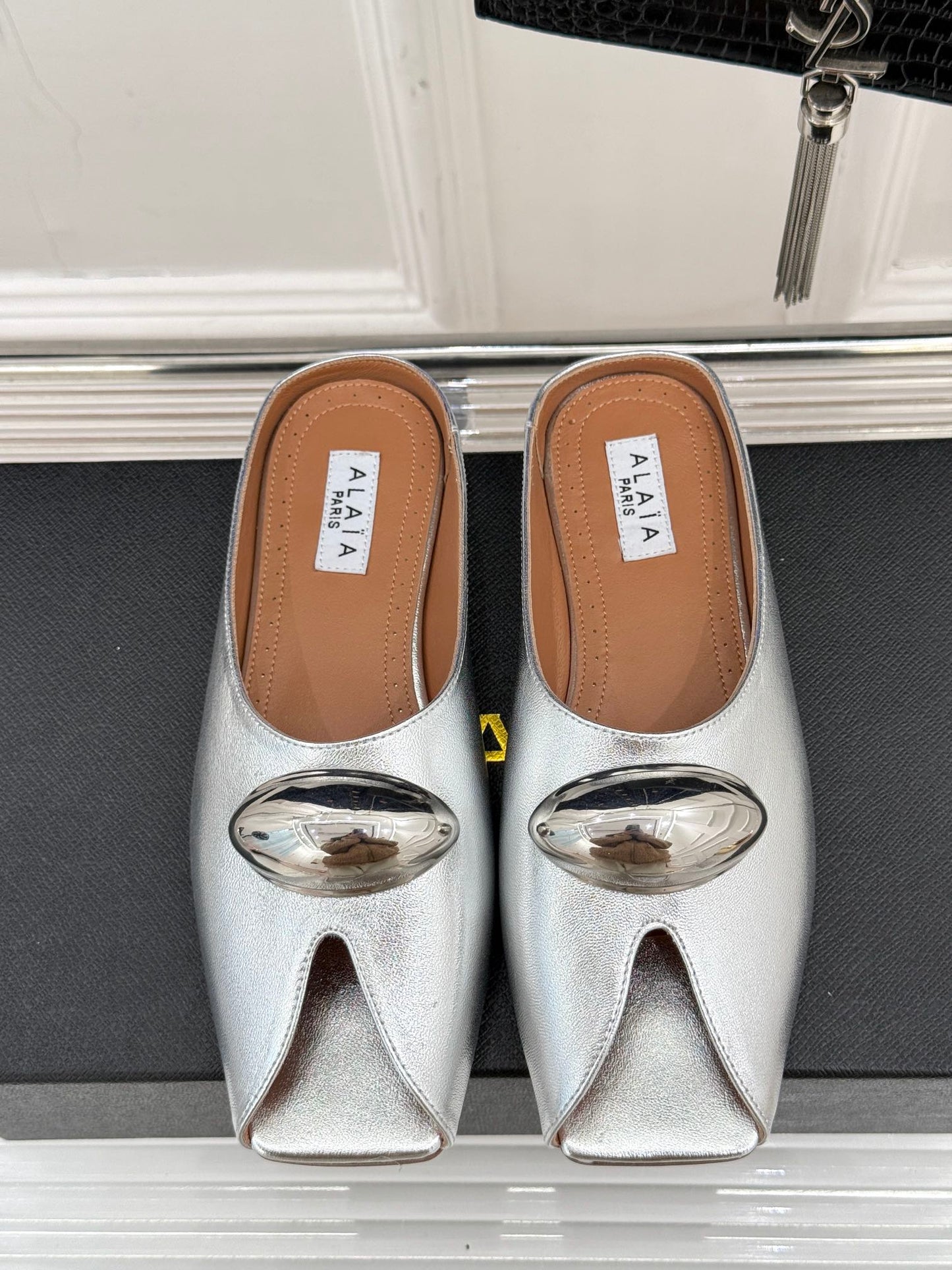 ALAIA FLAT MULE IN SILVER LAMBSKIN WITH SILVER HARDWARE - 35